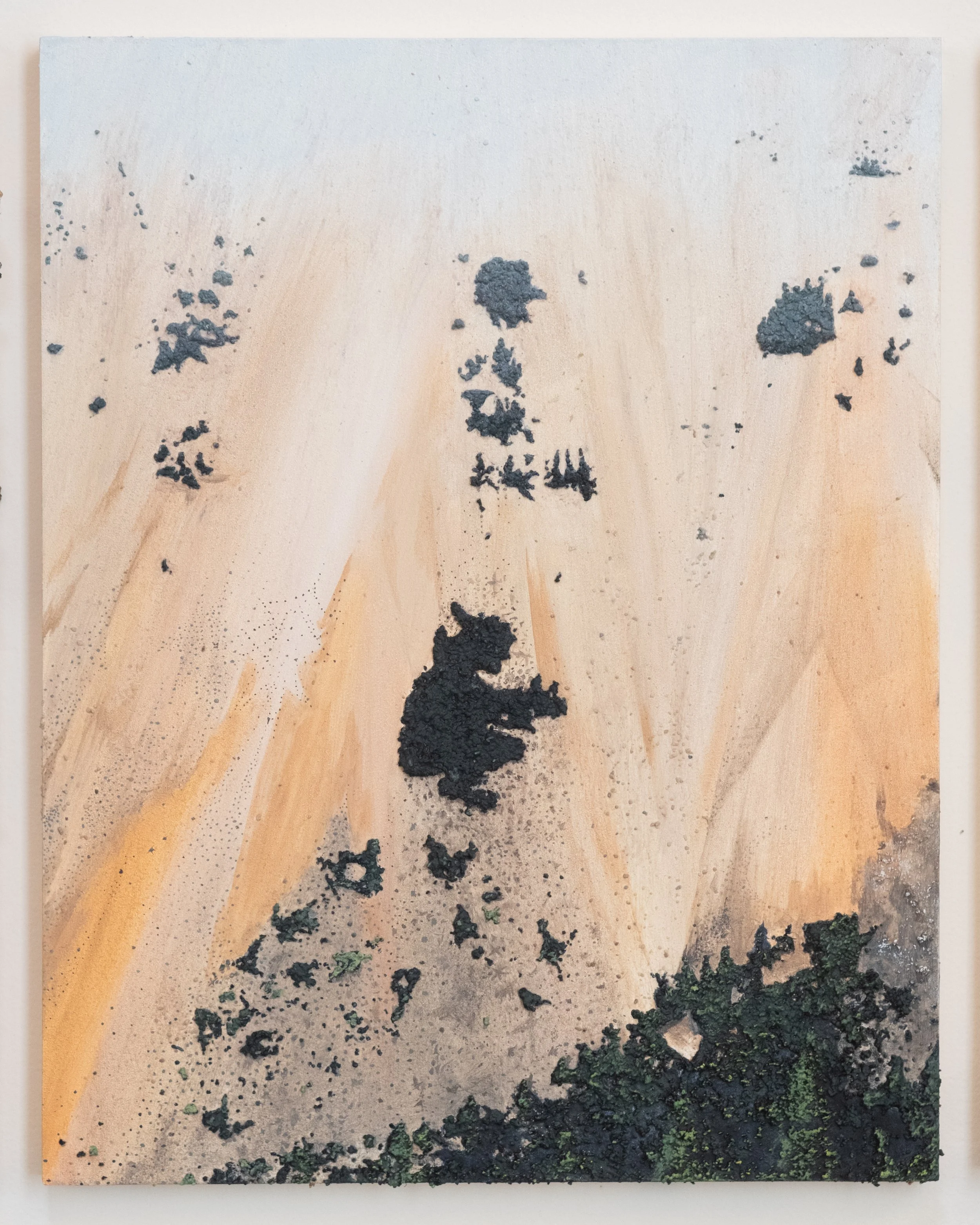 A painting of a mountain side in Montana with a wooden surface with black copper overburden and green paint stipples and streaks, creating a textured abstract pattern.