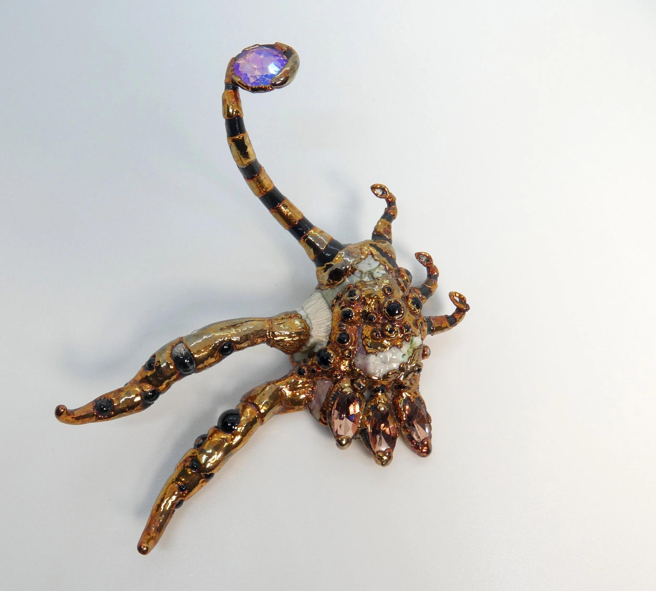 Emergence 003 (Into the Sunshine): seashell, barnacles, rhinestones, glass, epoxy clay, electroformed copper. 5" H x 4.5" W x 3" D
wall sculpture with keyhole slot. Available $300.
