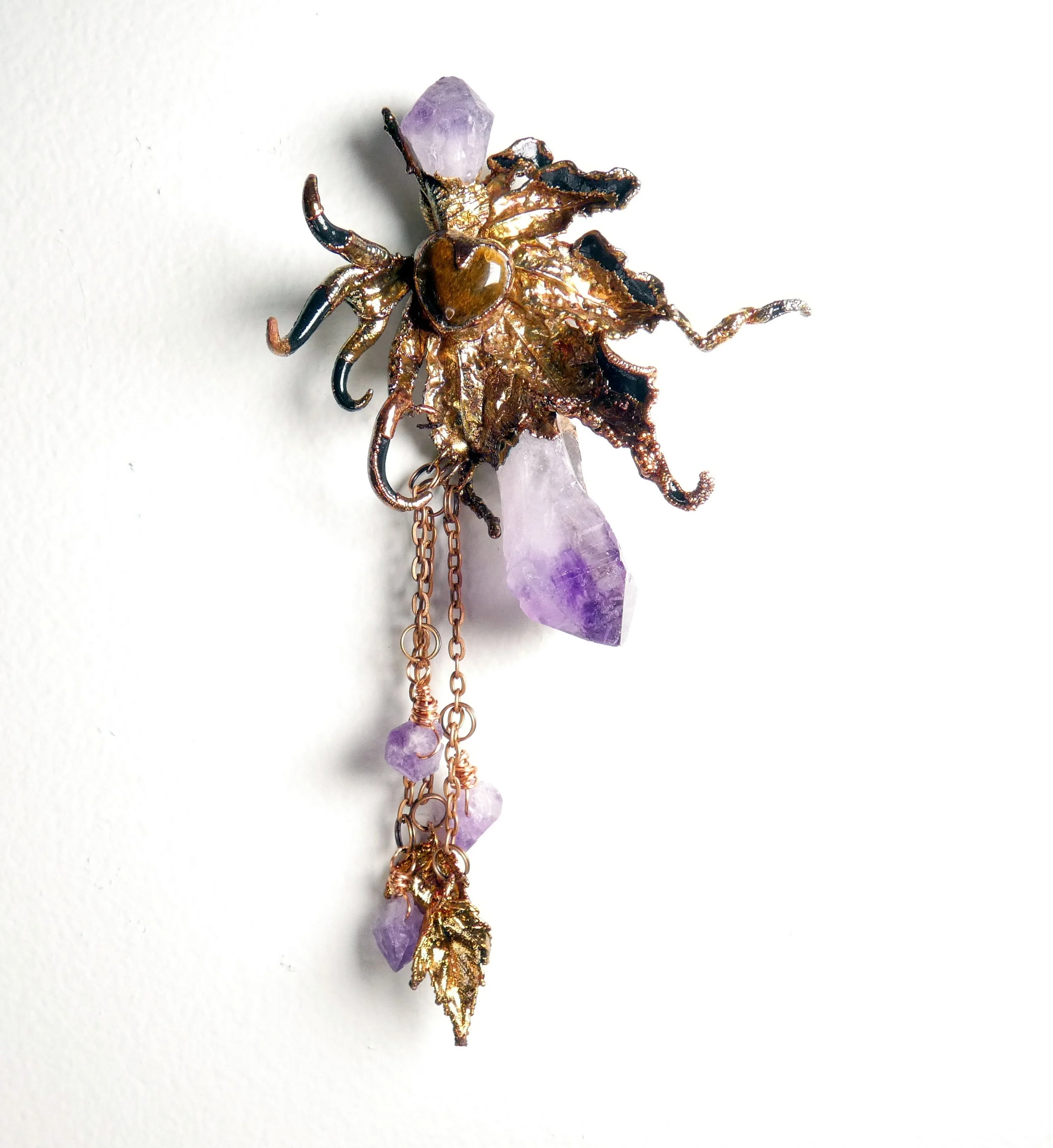 Symbiont 049 (Wall sculpture): Japanese maple leaf, crimson tipped maple leaves, amethyst crystals, tiger eye, copper chain, epoxy clay, electroformed copper. 6" H x 5" W x 2” D. Not for sale - a gift to my husband for our copper 7th anniversary.