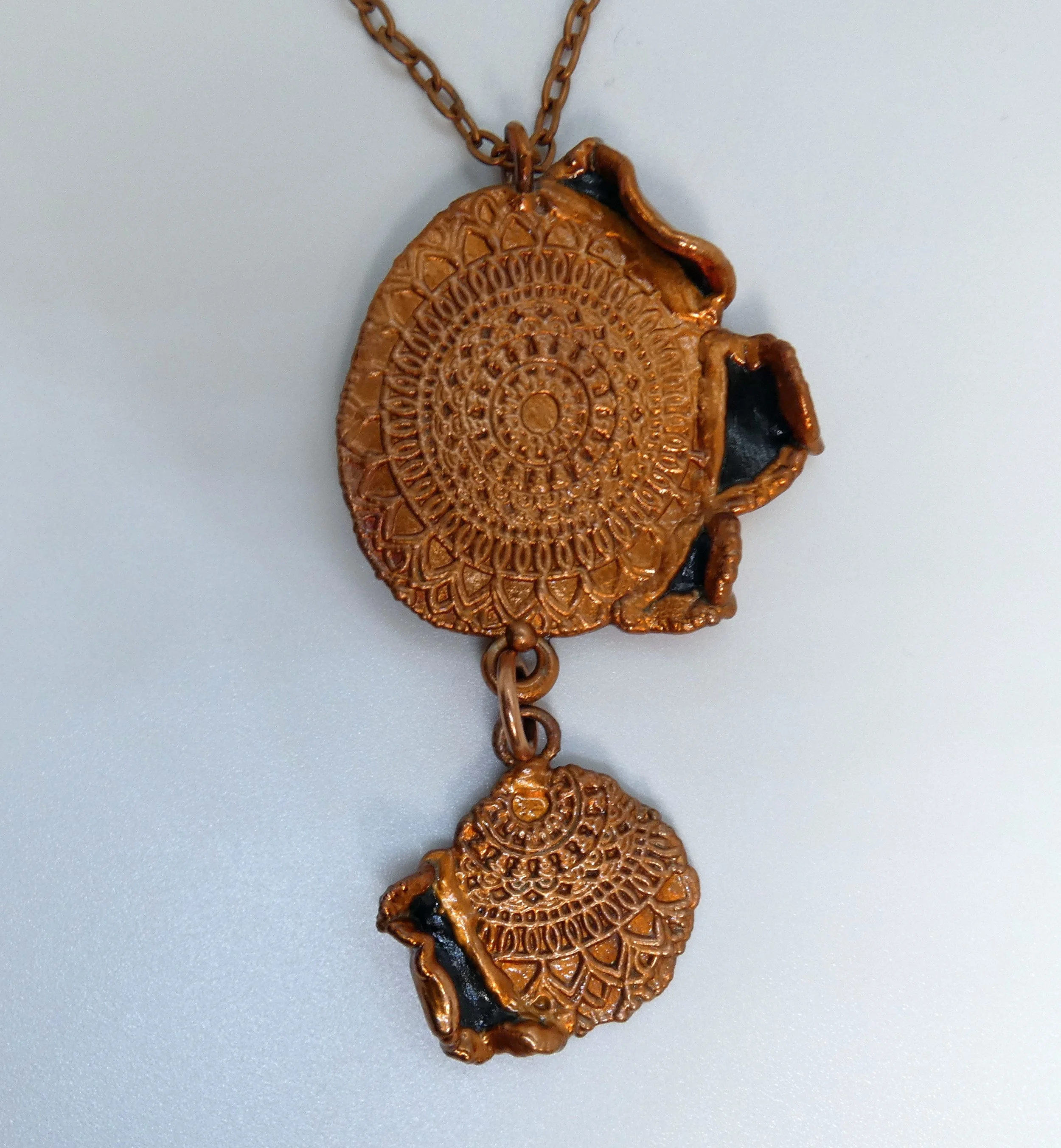 Symbiont 003 (Pendant): epoxy clay electroformed in copper. 4” H x 2” W. Available $150
