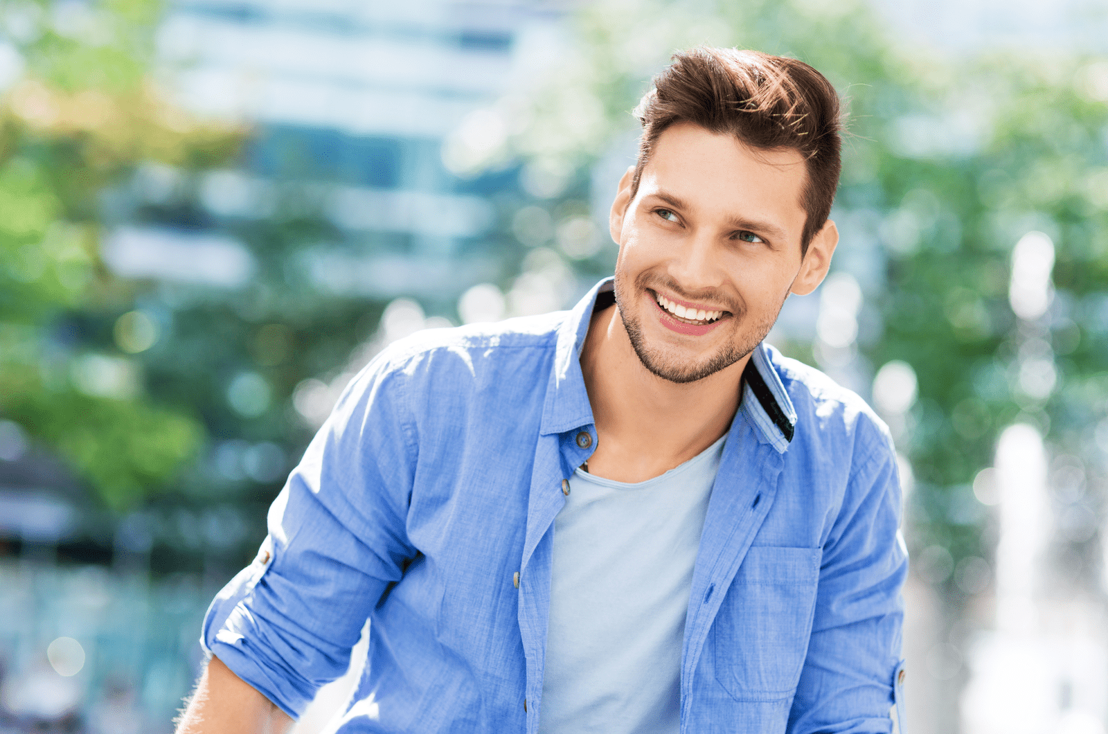 a-smiling-man-looks-away (2).png