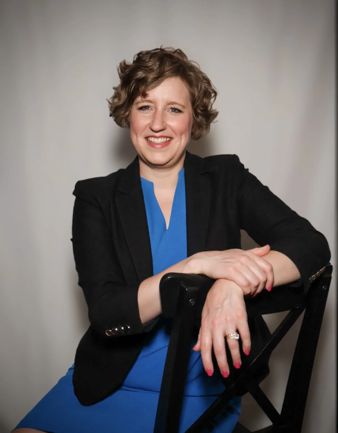 Professional portrait of a Colorado family law attorney for a DIY divorce course website.