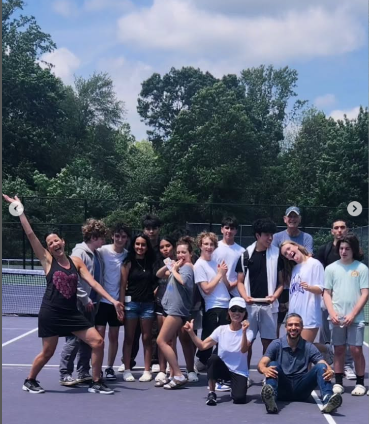 Purpose - driven projects drive our work. Above is a picture of students with members of Stamford Pickleball Association who commissioned us to build paddle holders that can be found throughout city parks.