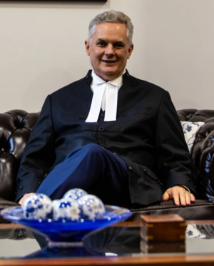 Justice Grant Riethmuller.png