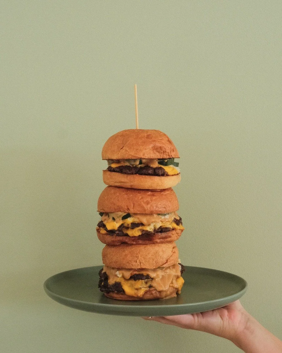 Single, double or triple? Why not all 3 stacked unnecessarily on one plate? Seriously though, if you ask we'll do it 🍔🍔🍔

cheeseburger w/ american cheddar, onions, house made pickles &amp; our burger sauce on a toasted brioche bun w/ house seasone