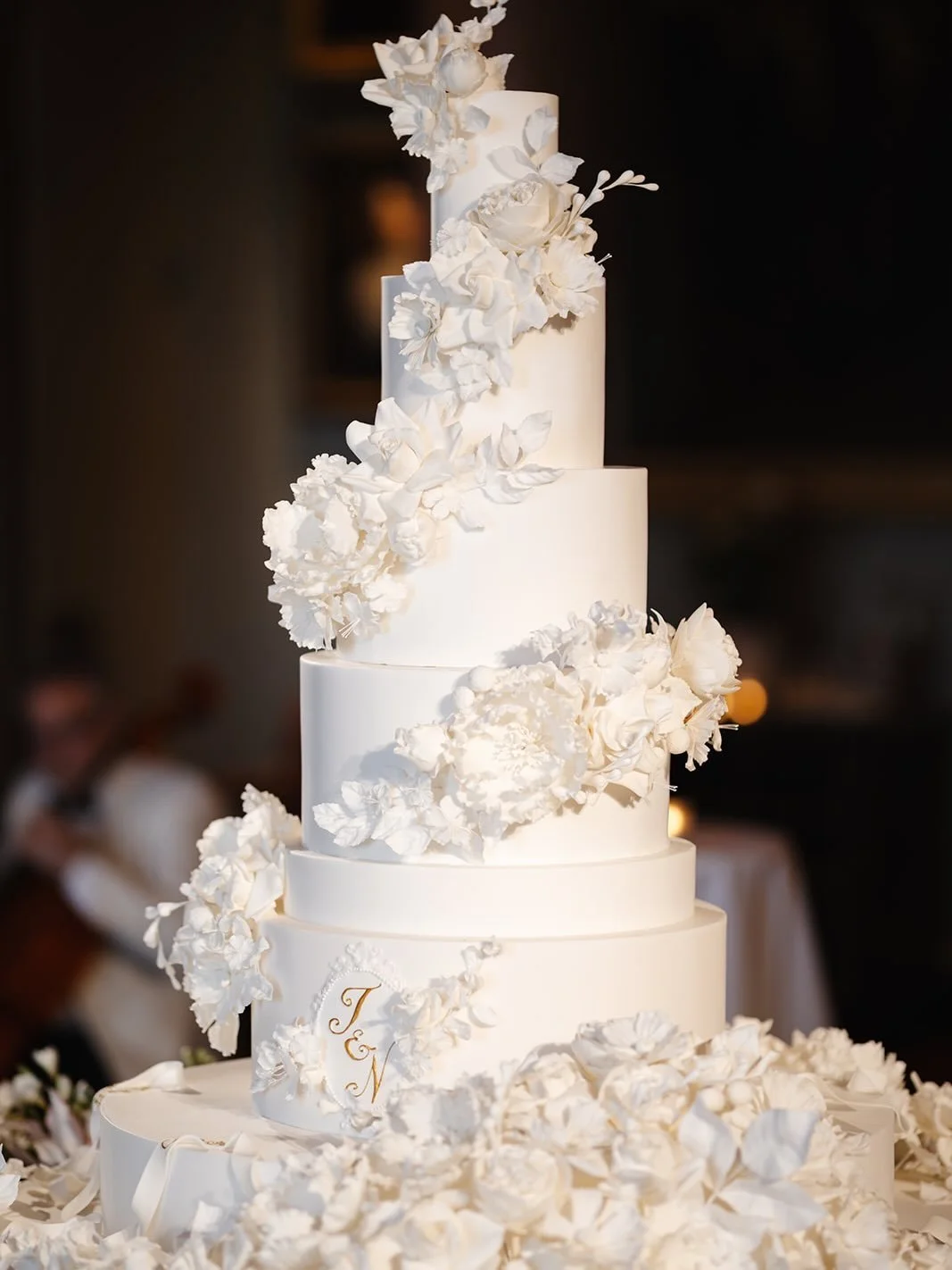The design that @clareowencakes created for J&amp;N in April this year was an absolute showstopper: eight tiers to represent the eight years they had been together, an abundance of the most exquisite and intricate sugar flowers echoing the floral ins