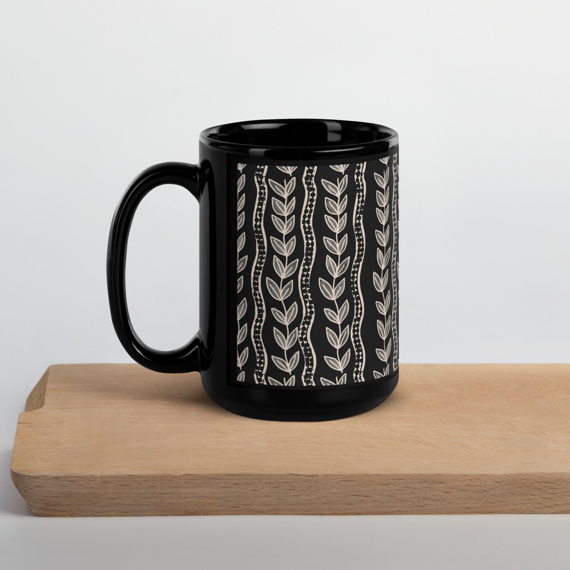 black-glossy-mug-black-15-oz-handle-on-left-687776332f9f6.jpg