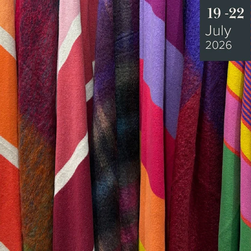 Colourful, pinks throw by Green Grove on display Home & Gift july 2026