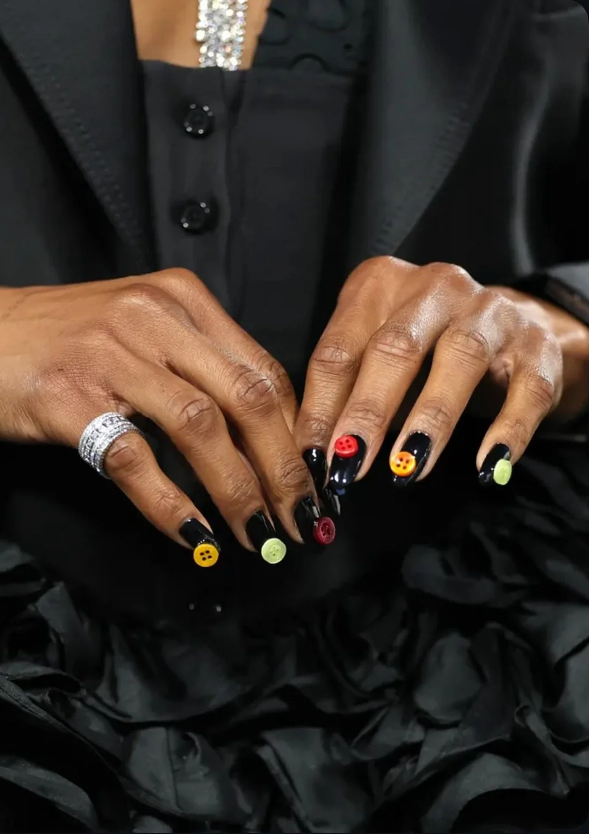 Ego Nwodim opts button nails