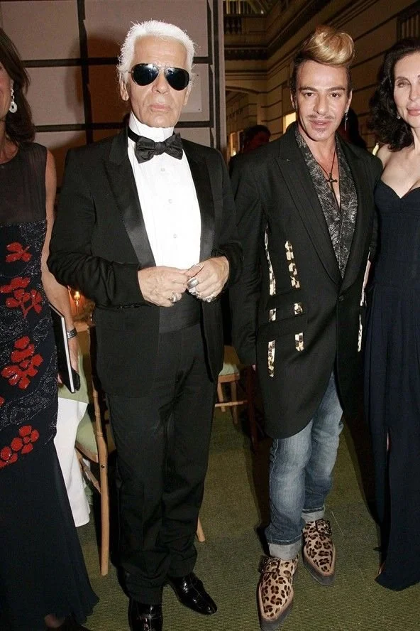 Karl Lagerfeld and  John Galliano