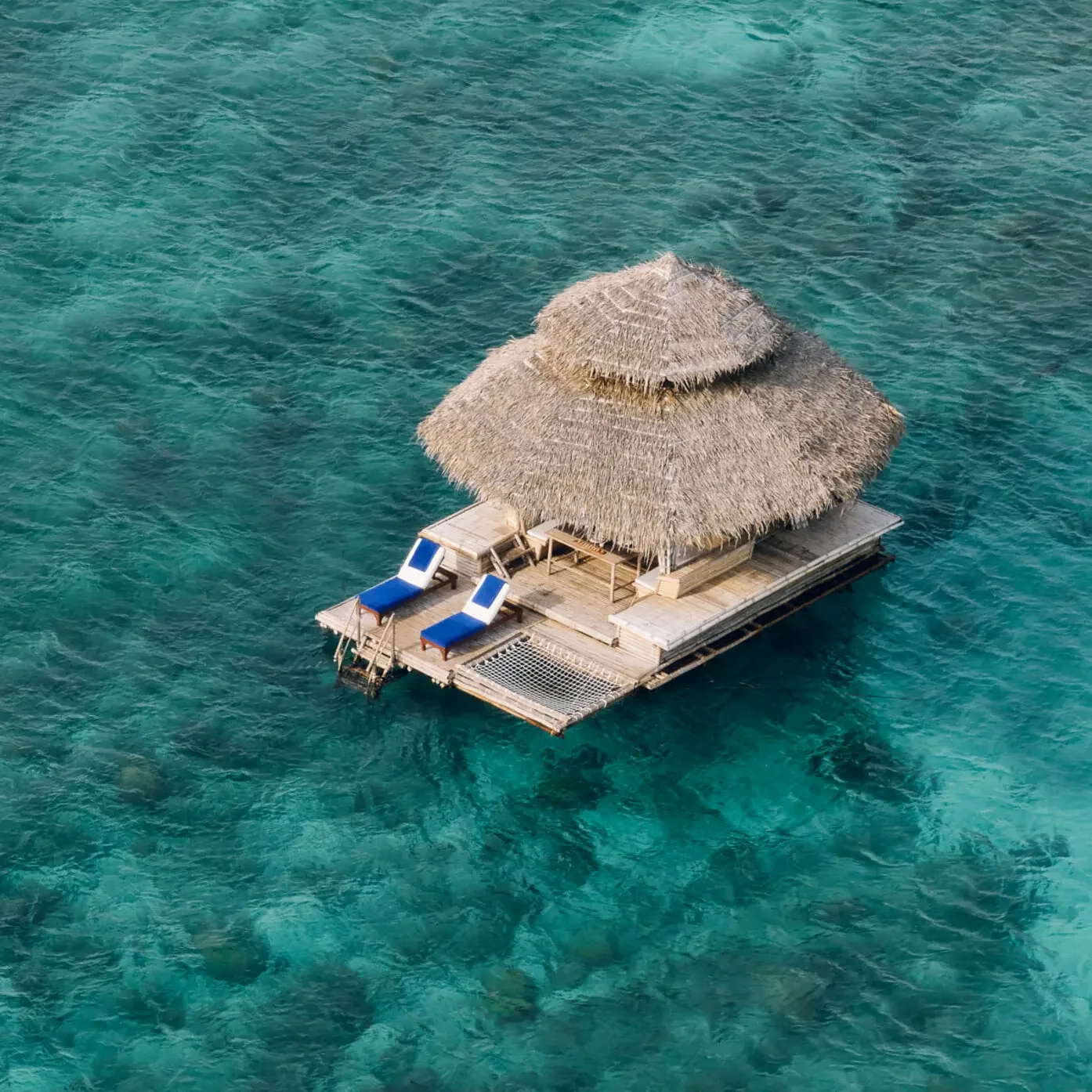 amanpulo_philippines_-_experience_floating_kawayan_bar_aerial_4.webp