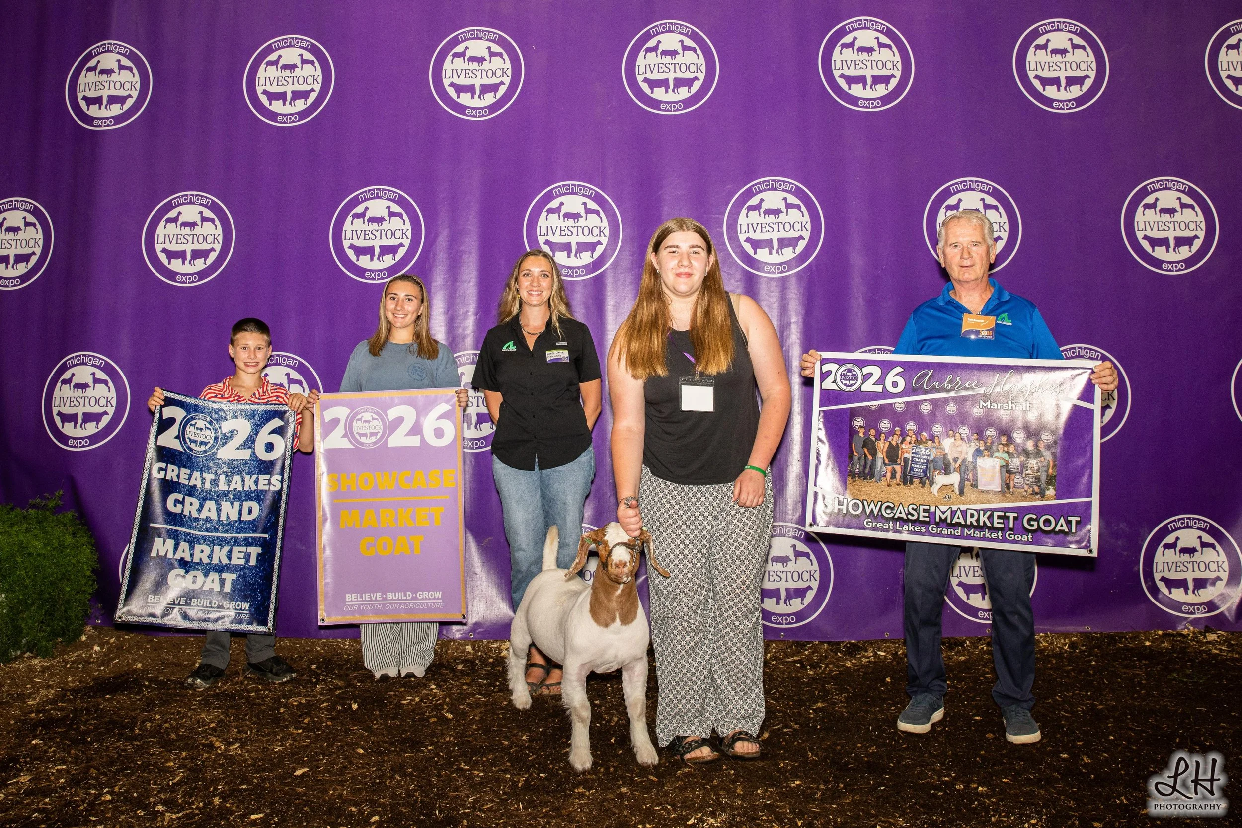Saleabration backdrop Great Lakes Grand Market Goat shown by Aubree Hughes 2026