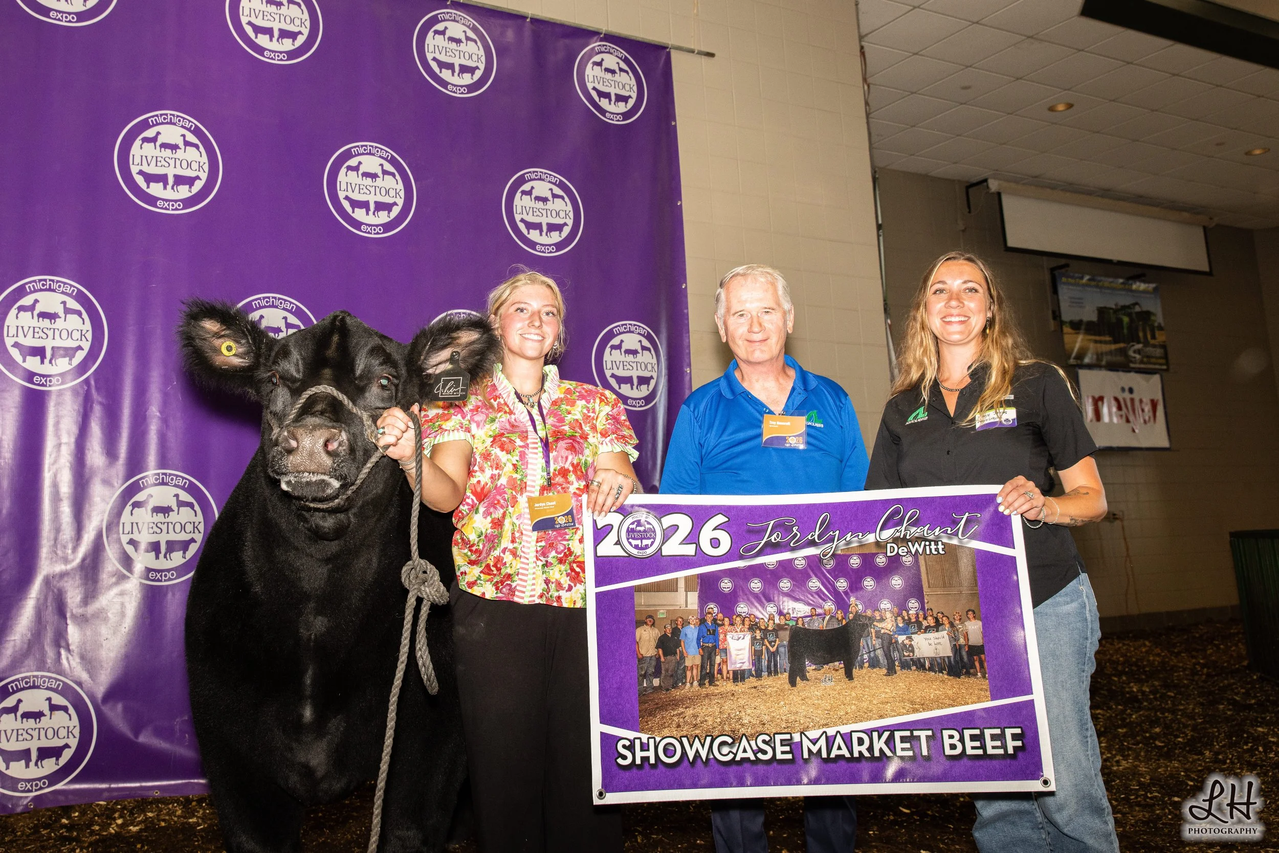 Sale-a-bration 2026 backdrop with Showcase Market Beef shown by Jordyn Chant.