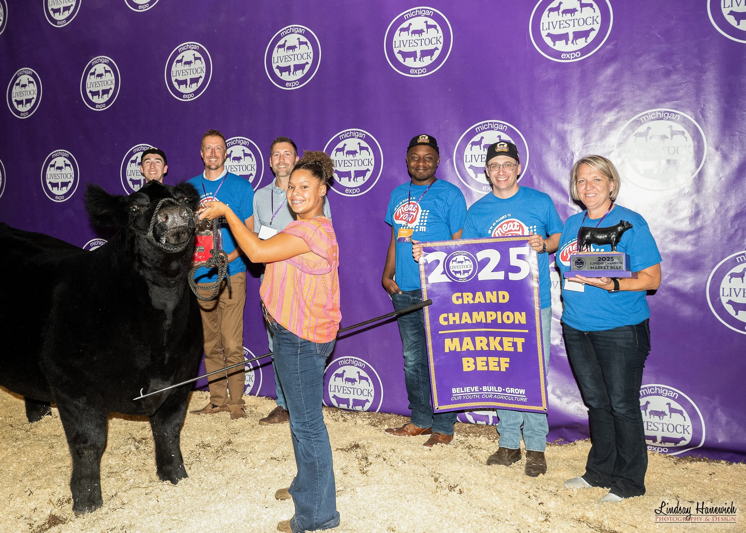 2025 MLE Sale-abration Backdrop photo with Samia Wildt and buyer