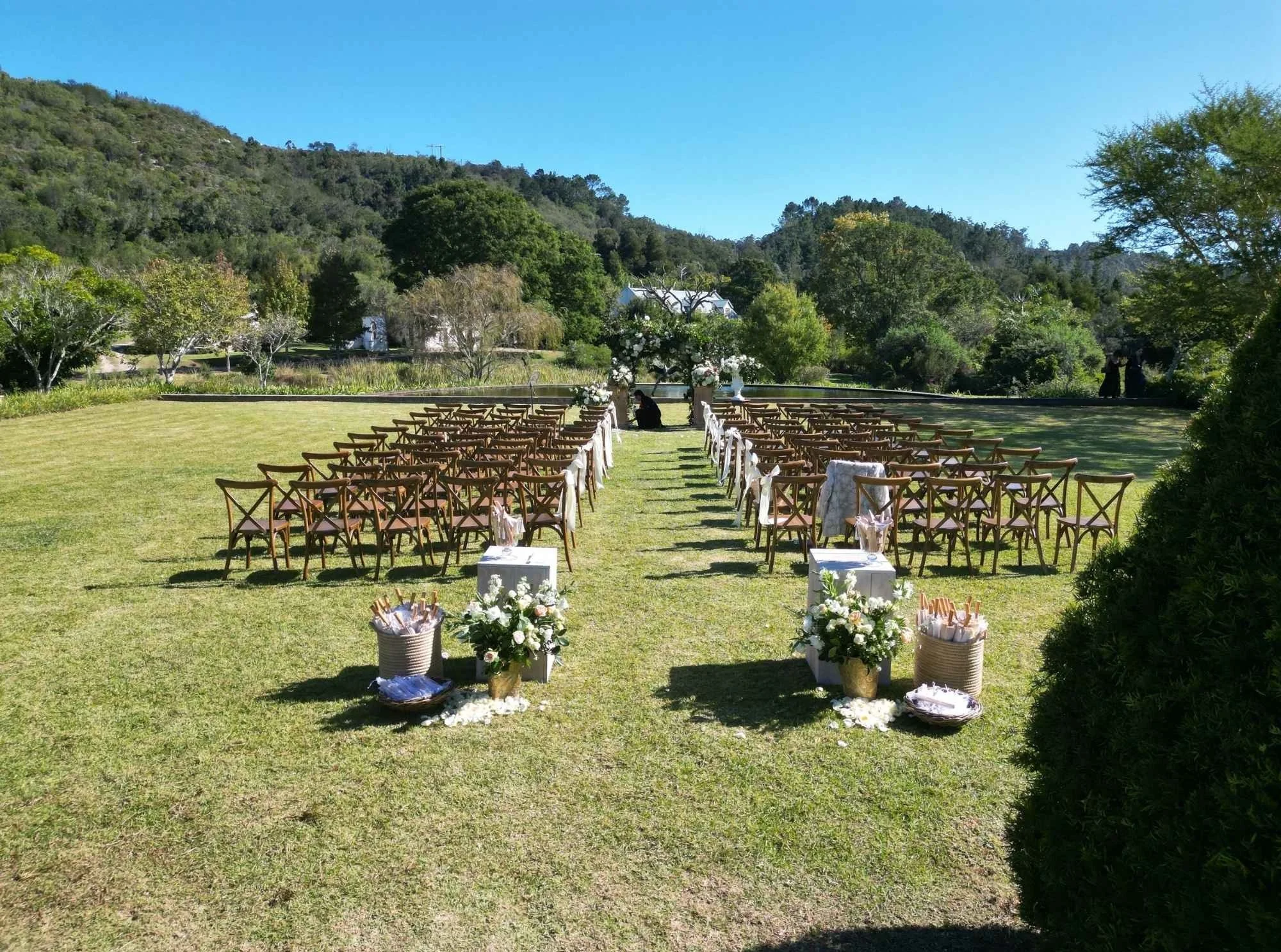 Cross Back chairs ceremony Bosky Dell Rose Farm.jpg