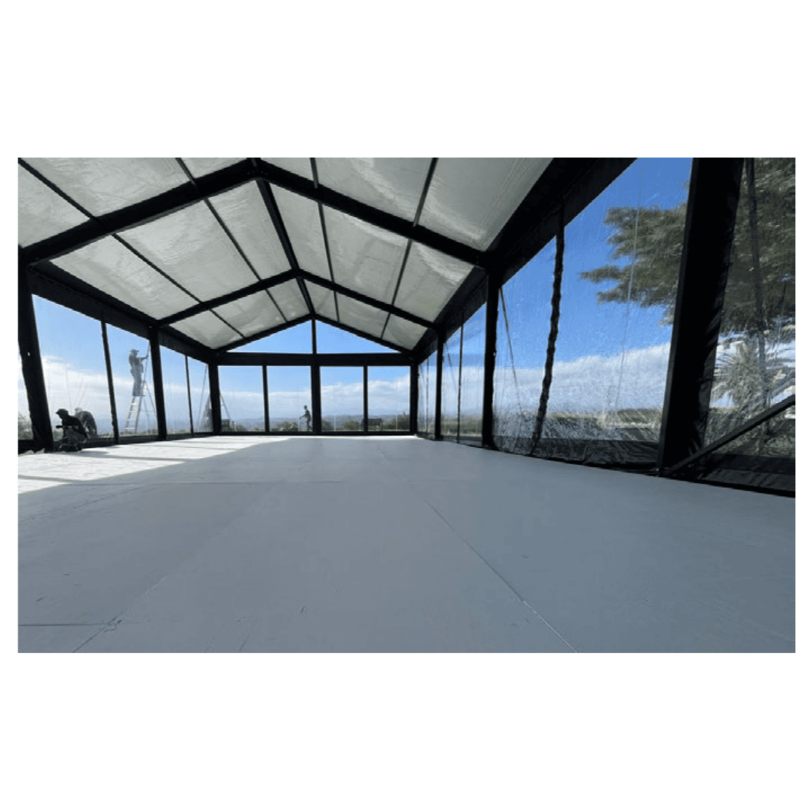 black marquee tent with Full event floor covering for wedding and corporate event hire by Du Toit Events in Plettenberg Bay and the Garden Route