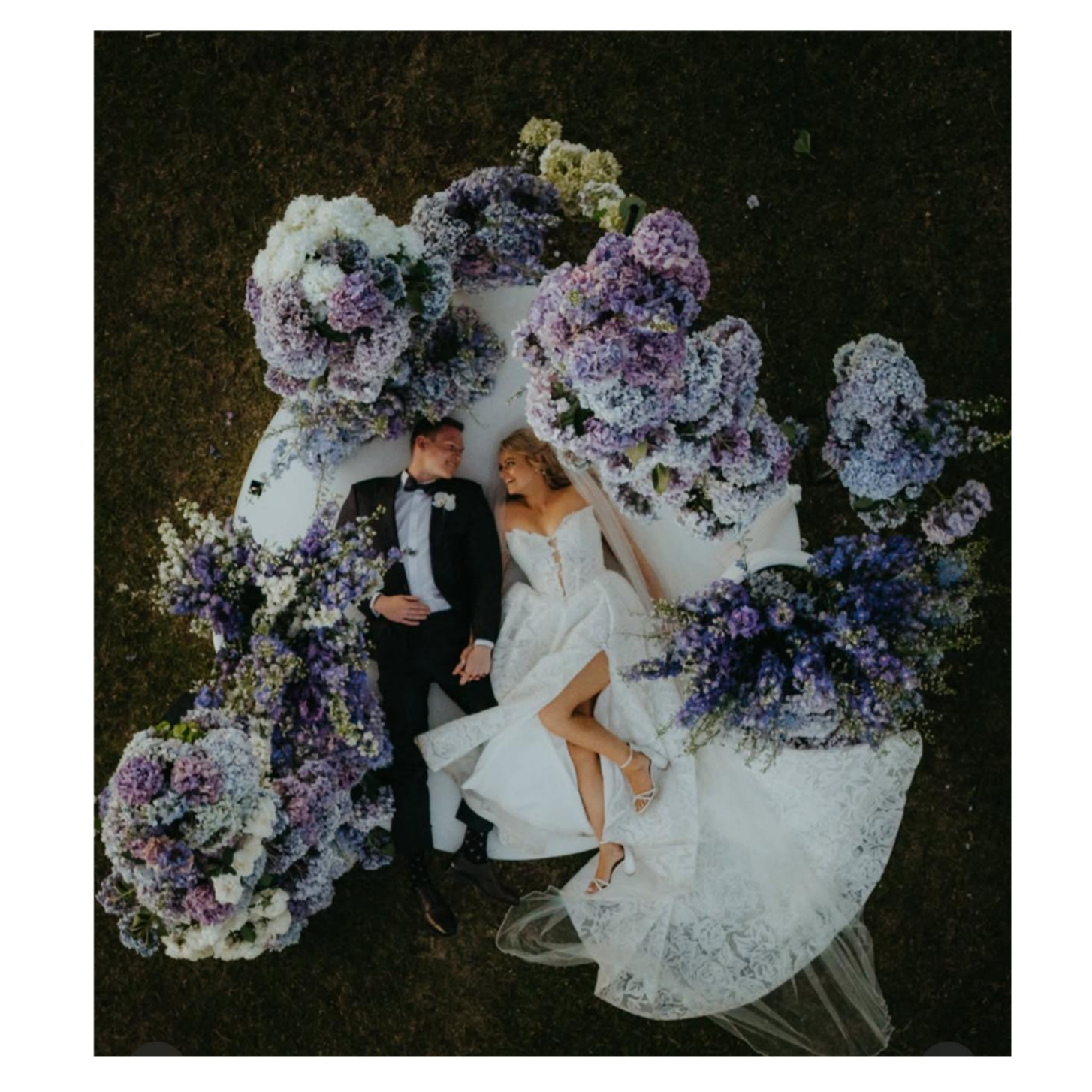 bride & groom on 2.4m round event platform with blue hydrangeas for wedding and corporate event hire by Du Toit Events in Plettenberg Bay and the Garden Route