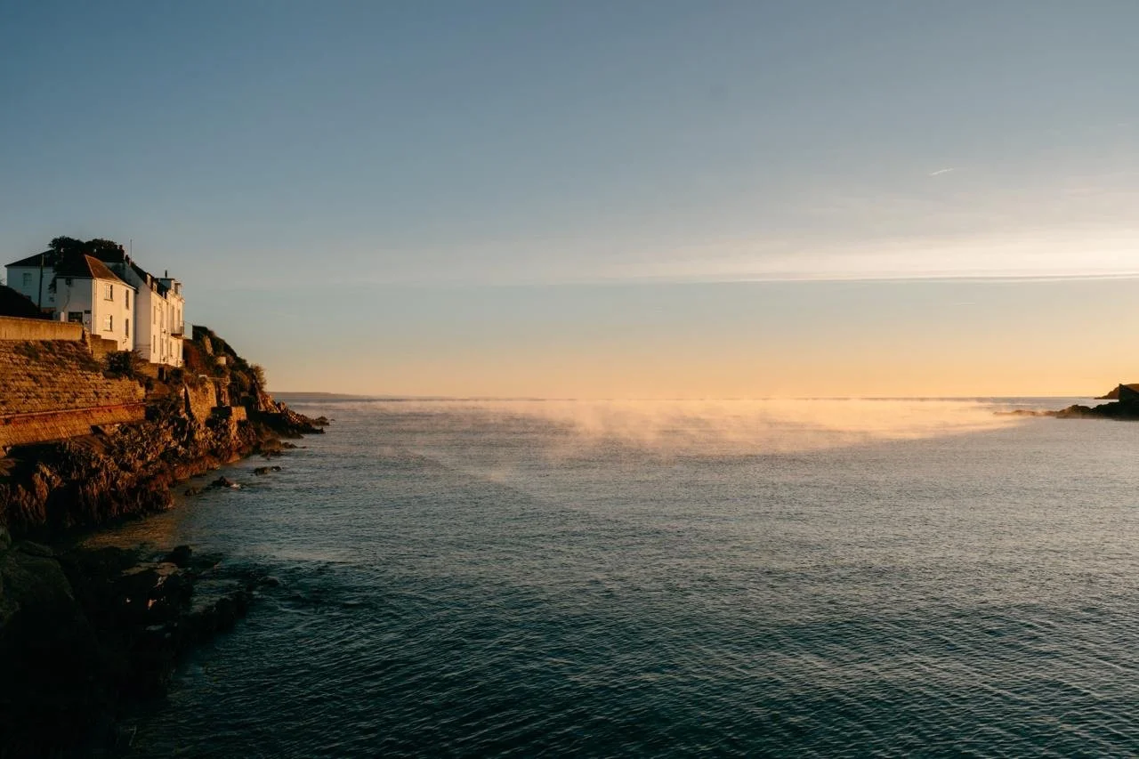 the_rising_sun_inn_portmellon_view_of_the_cove_at_dawn.jpg