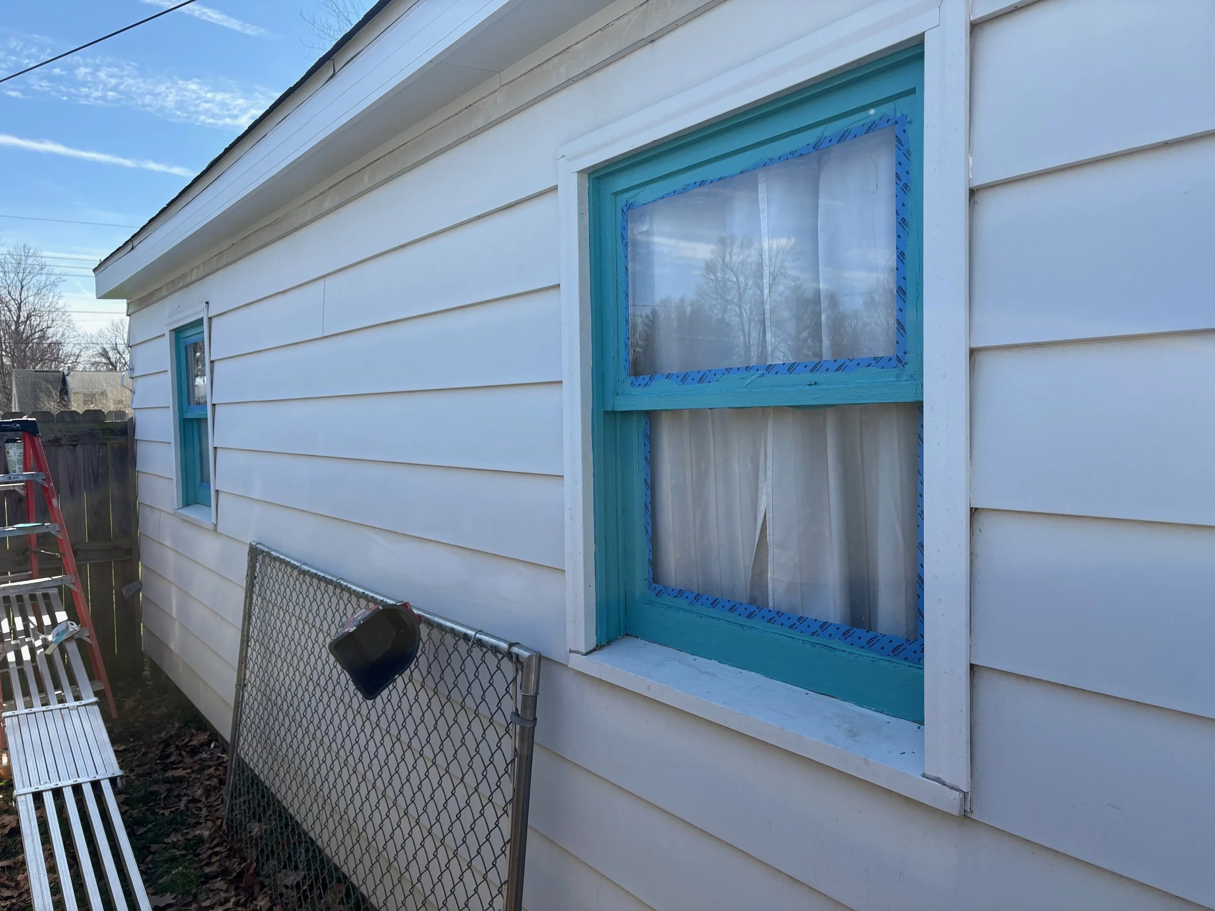 After - Fresh paint/repaired soffit/fascia