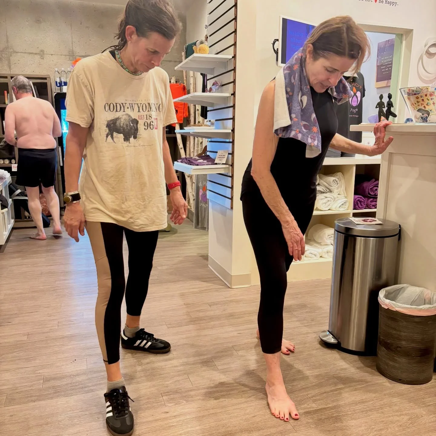 We are NOONERS, of course we stay after class to chat and socialize and yes, even help each other with postures.