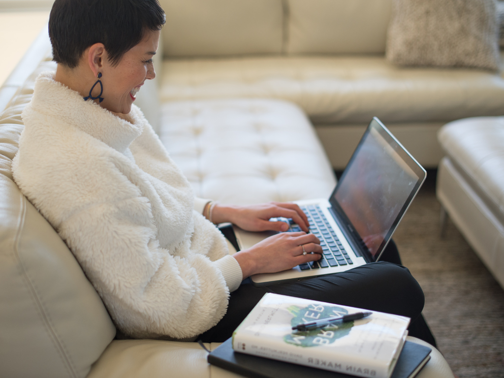 Erica Ballard on her laptop