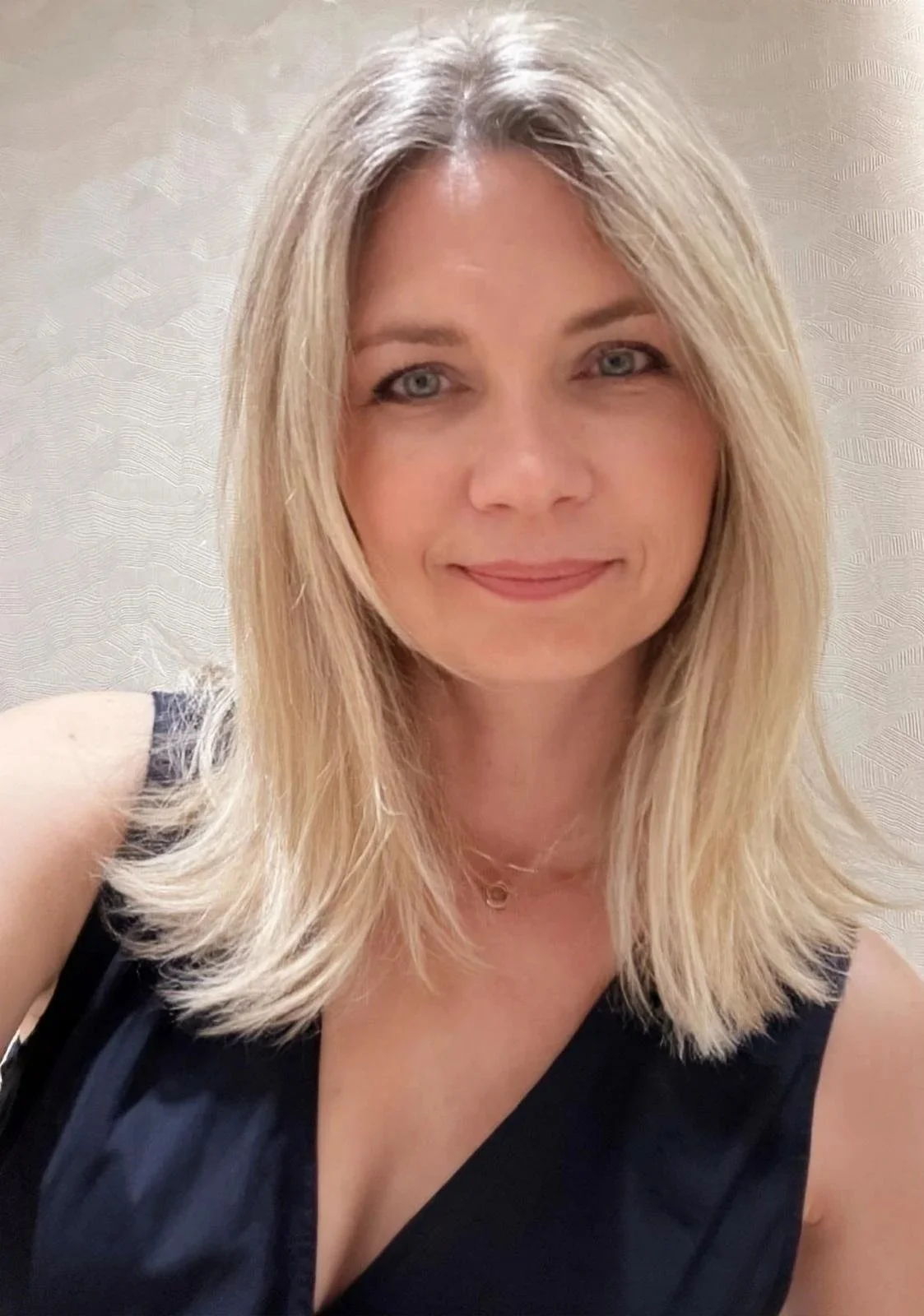 Midlife woman living with clarity, ease, and purpose through self-agency.