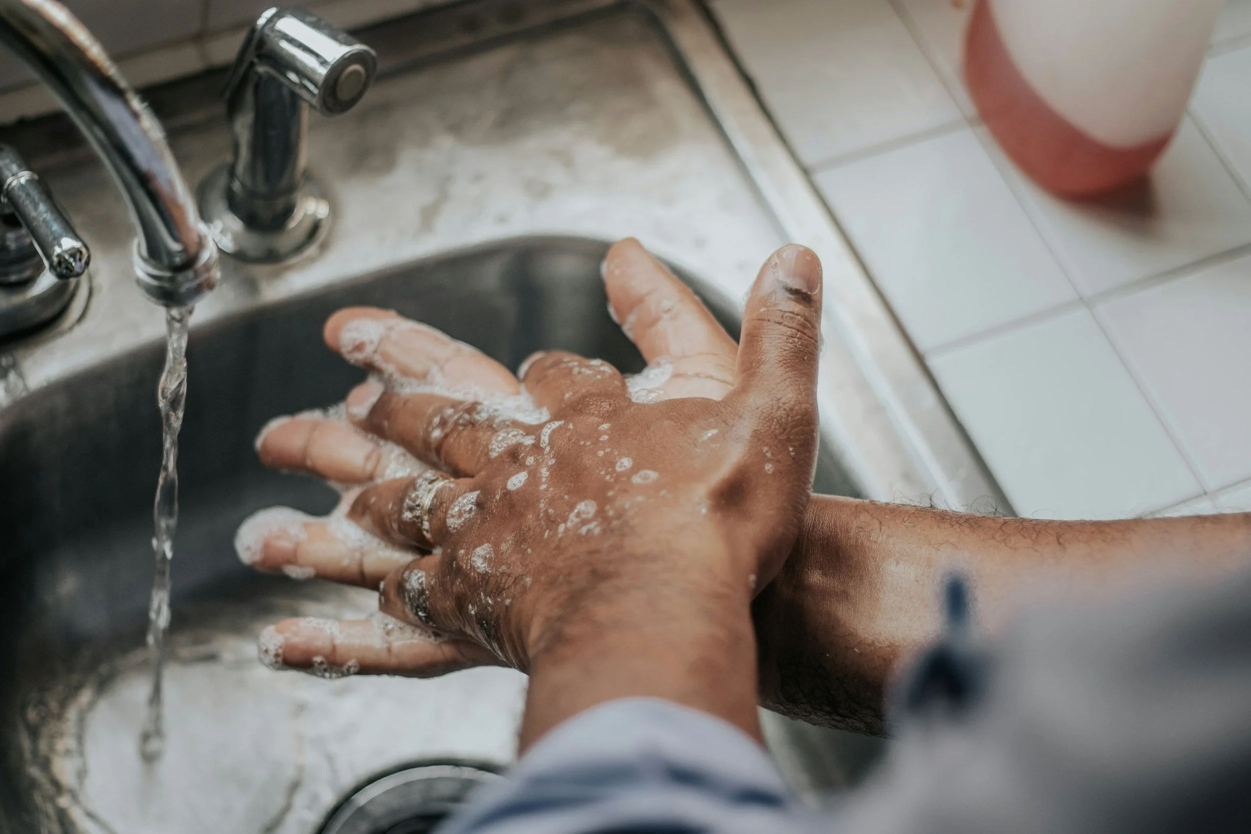 person excessively washing hands