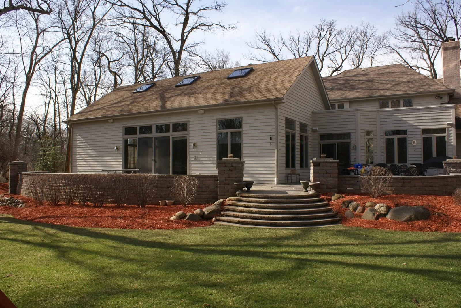 Cream-colored custom home with a covered patio in Algonquin, Illinois
