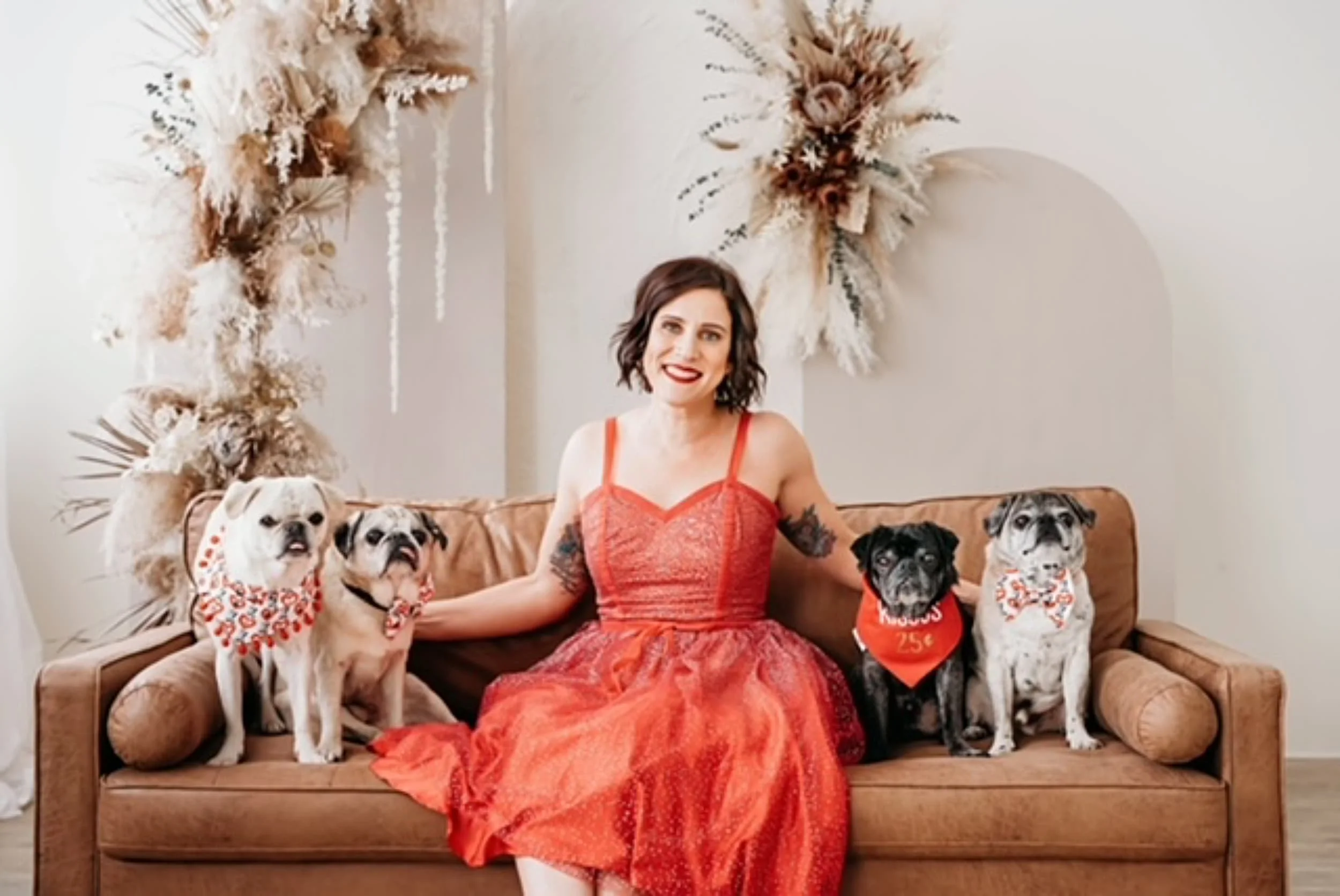 Dapper Dog Dining owner Maggie Cairol with her pugs