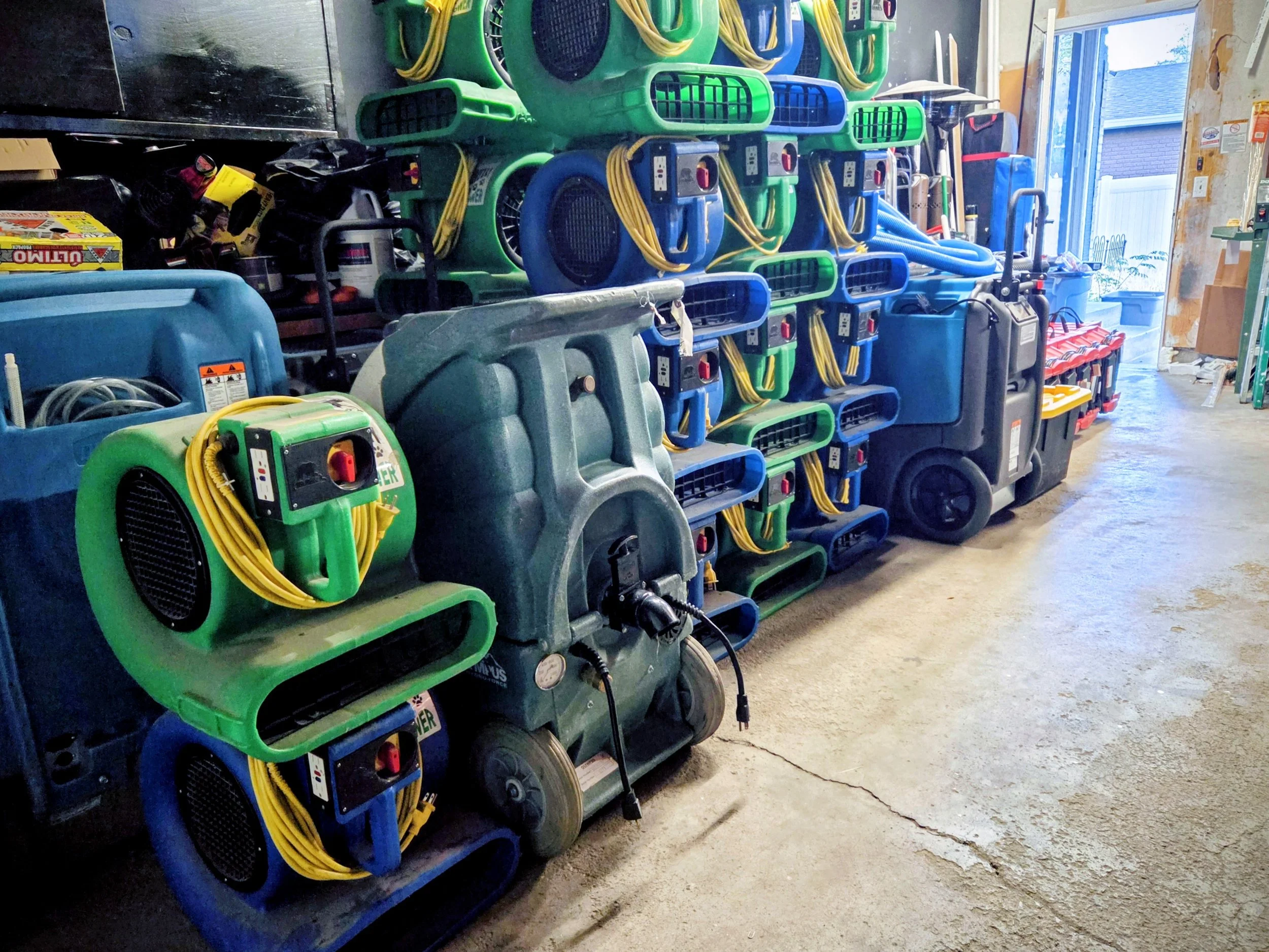 Professional air movers and restoration equipment used for fire and smoke damage cleanup