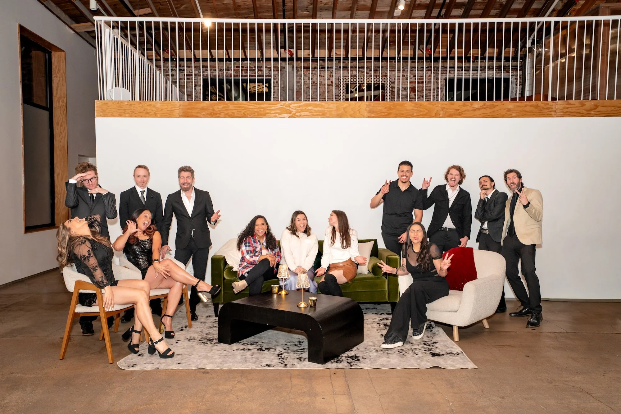 Group photo of wedding vendors being silly