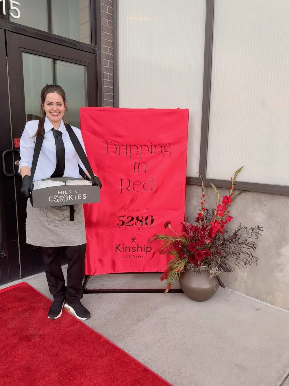 Dessert server carrying a tray of milk and cookies