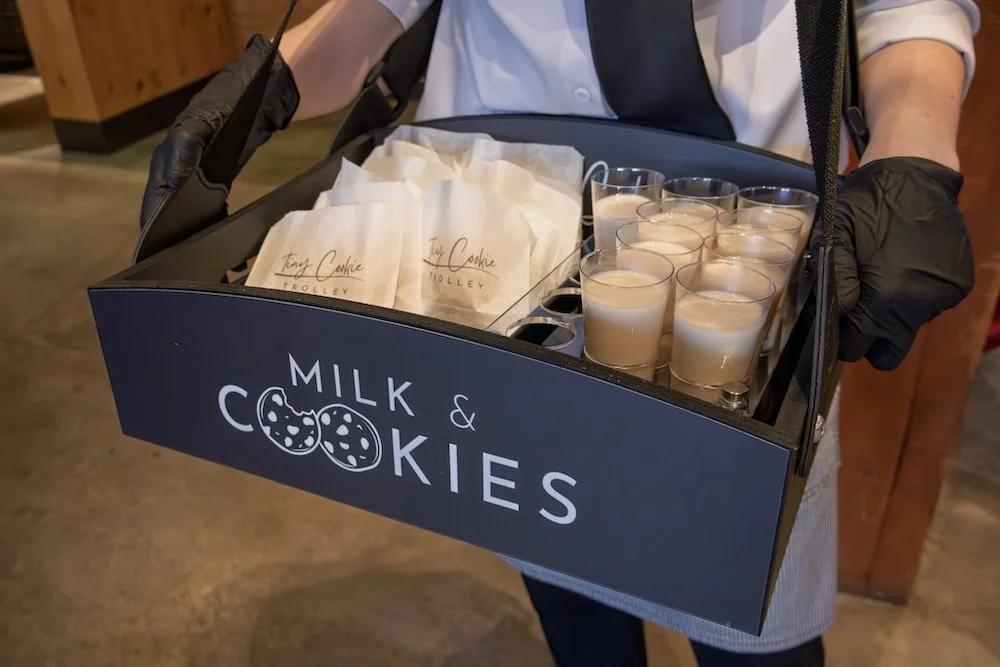 Usherette tray with cookies and milk