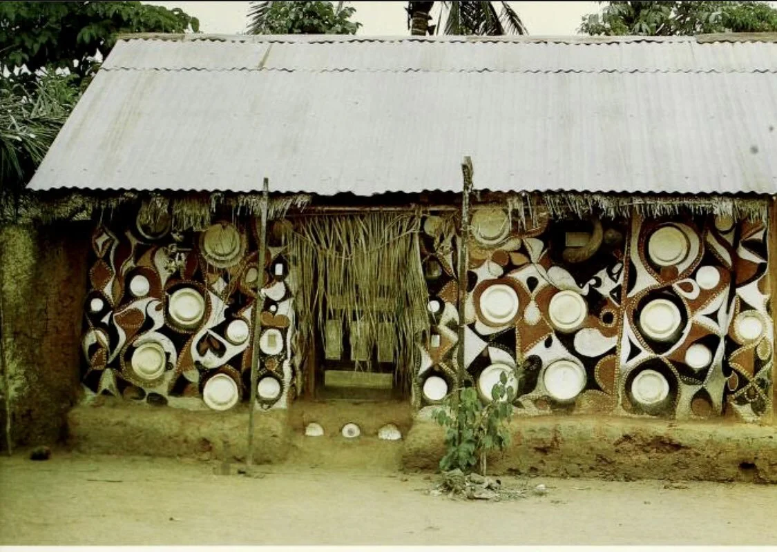 The residence of a diviner and cult priest in Umuoye, Etche, photographed in 1966.