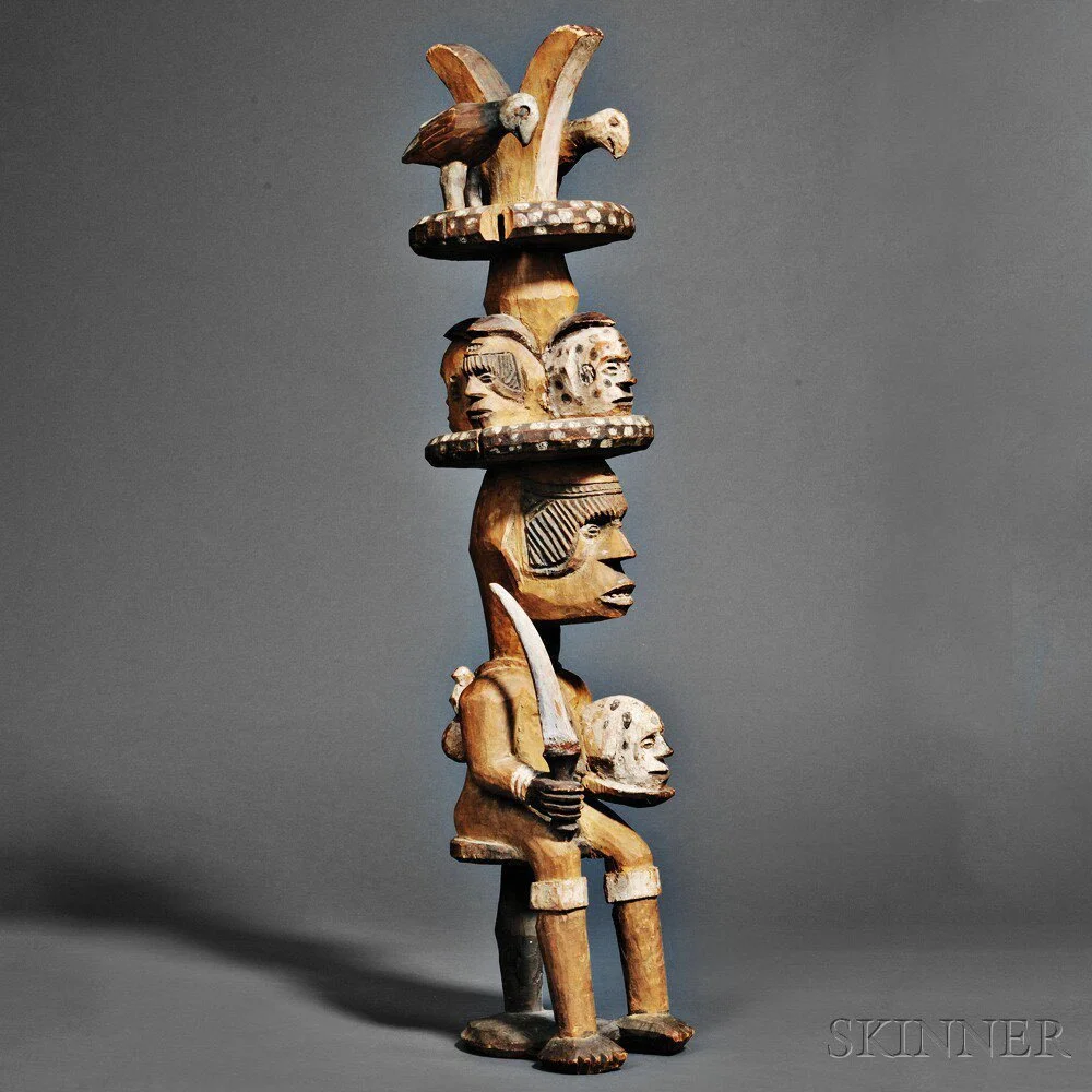 Seated Ikenga figure from the Igbo “cult of the right hand” and personal achievement, 20th century. Height: 28 ½ in. Auctioned by Skinner Auctioneers.