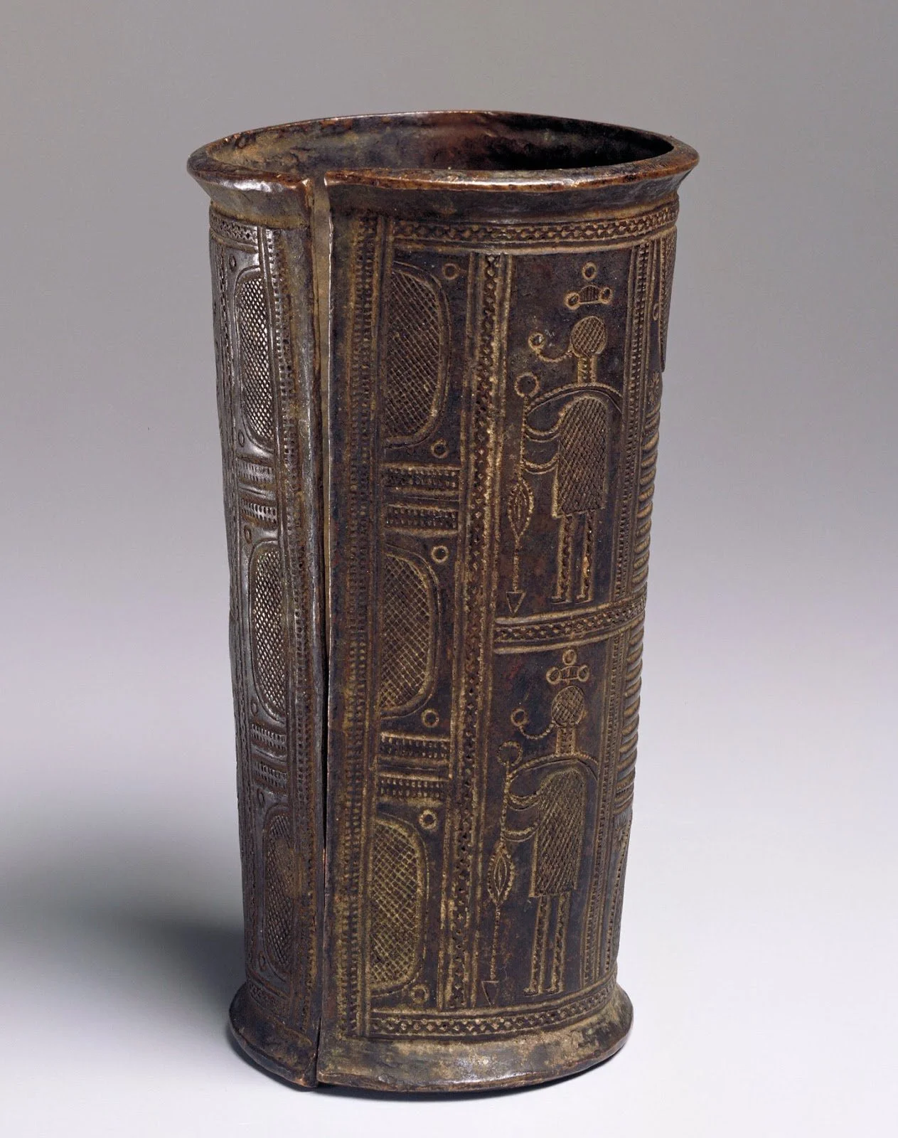 A bronze armlet of Igbo origin. Dated to the 19th or early 20th century. Housed at the Minneapolis Institute of Art.