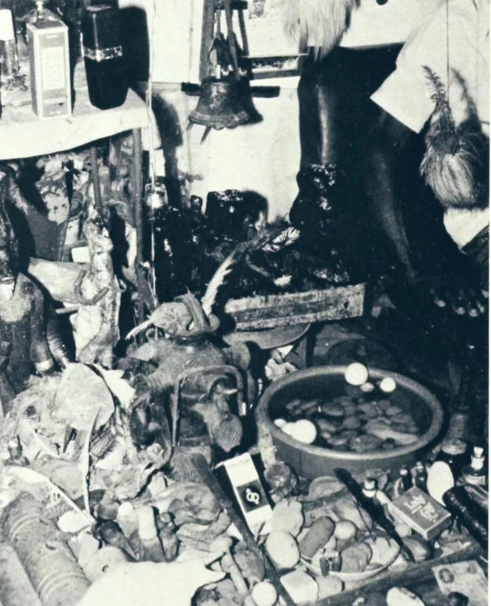Parts of Christopher Unigwe's divination shrine, including figures of Ishiagu made pots, and numerous madicines. 📸: 1983 by Herbert Cole.