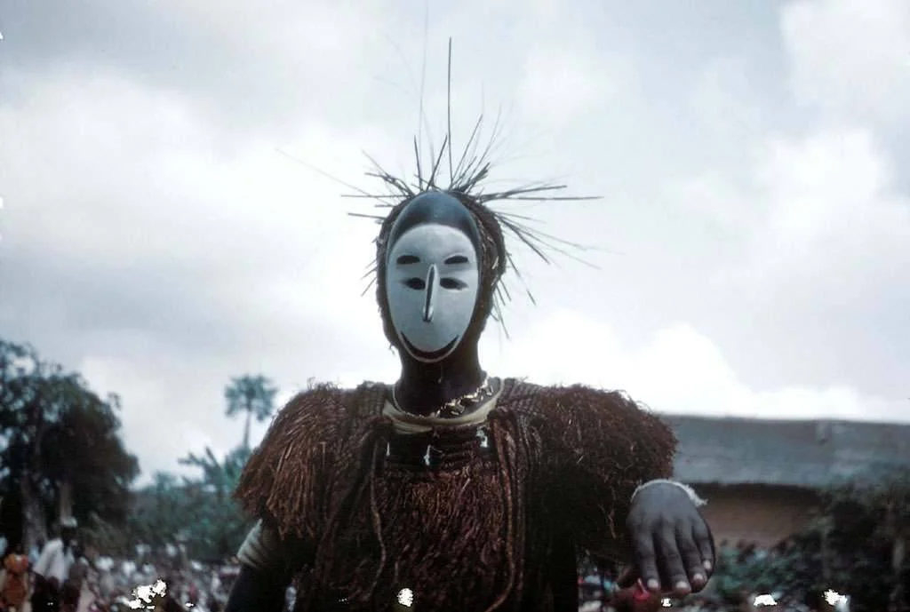 Igbo masquerader wearing the nne mgbo.