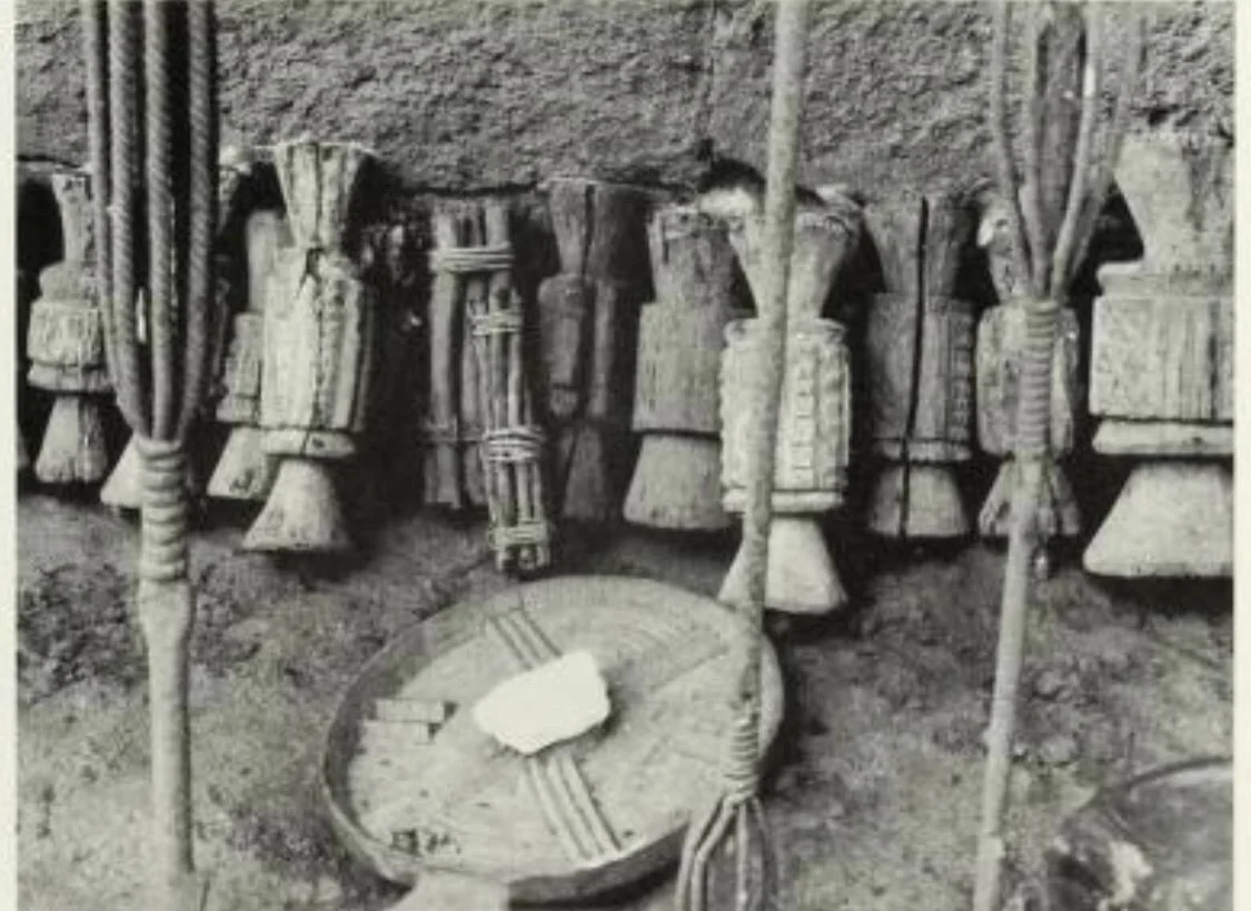 “Okposi, bound Umuada "daughters" sticks, a chalk serving plate, and details of wrought-iron staff.” Ezeagulu, Agulueri, 1983. 📸: K.C. Murray.