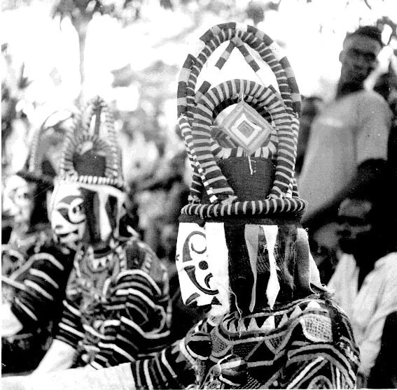 Obugula Mmau, daughter masks, Amuobia village. 📸: G. I. Jones.