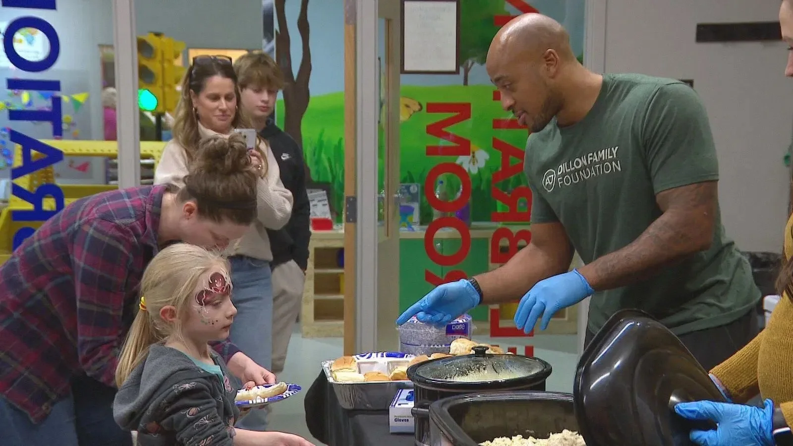 Packers' AJ Dillon sponsors Giving Tuesday event at Children's Museum of Green Bay