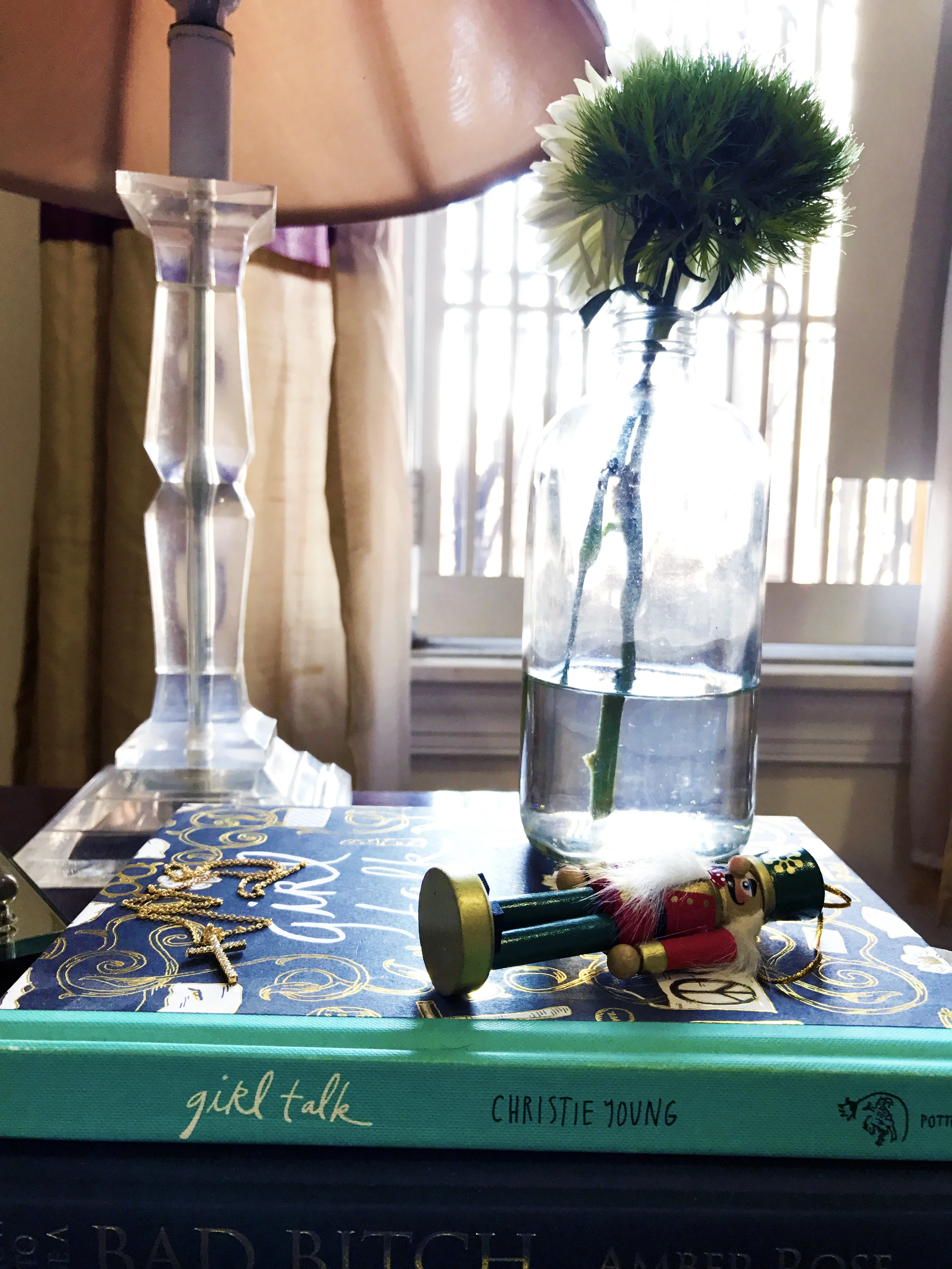 Layering on the nightstand creates effortless style.