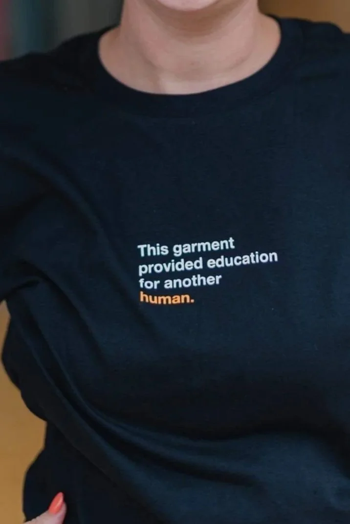 This Garment in Black 'This garment provided education for another human’