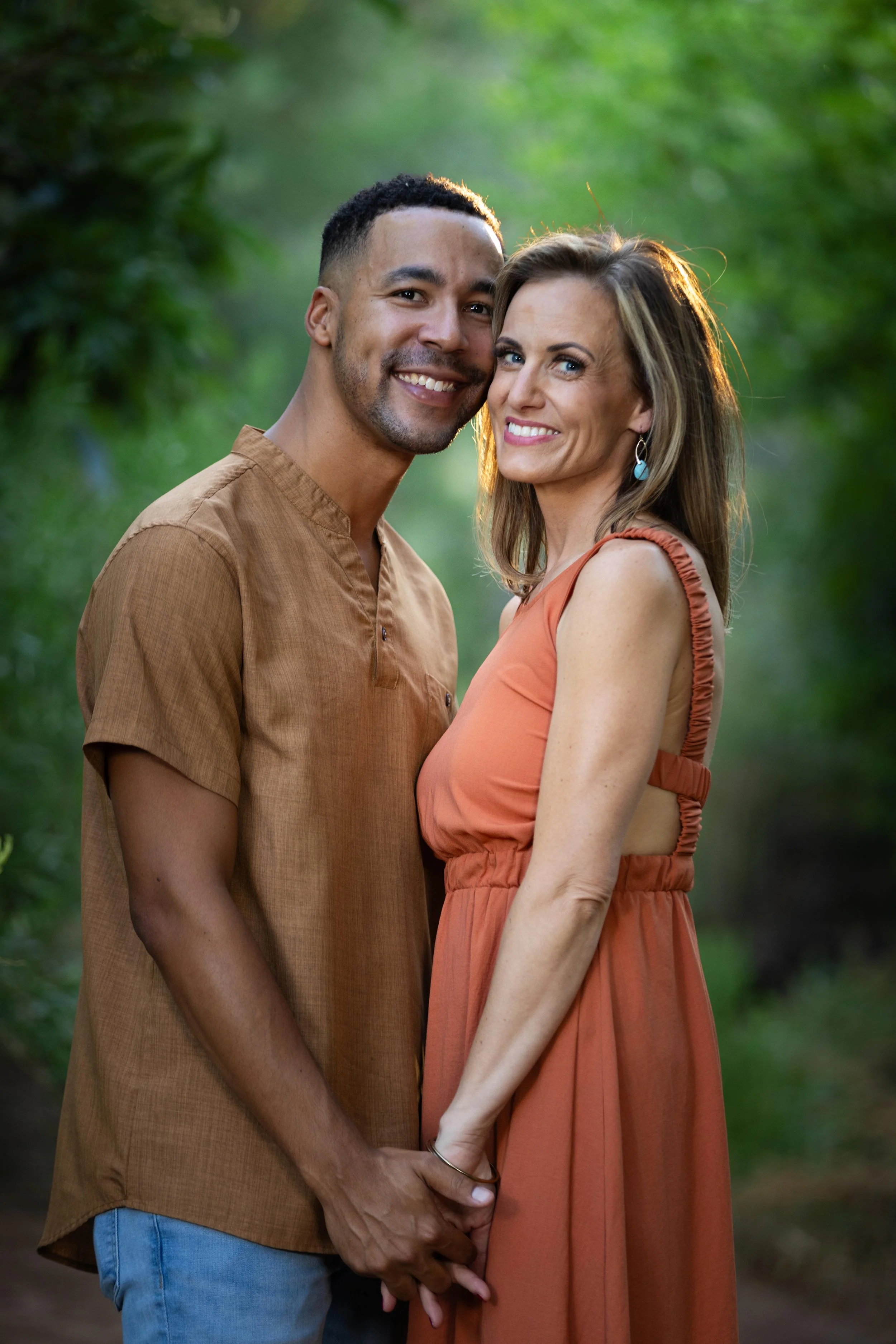 Couple cuddling close in Family photo in Saint George Utah