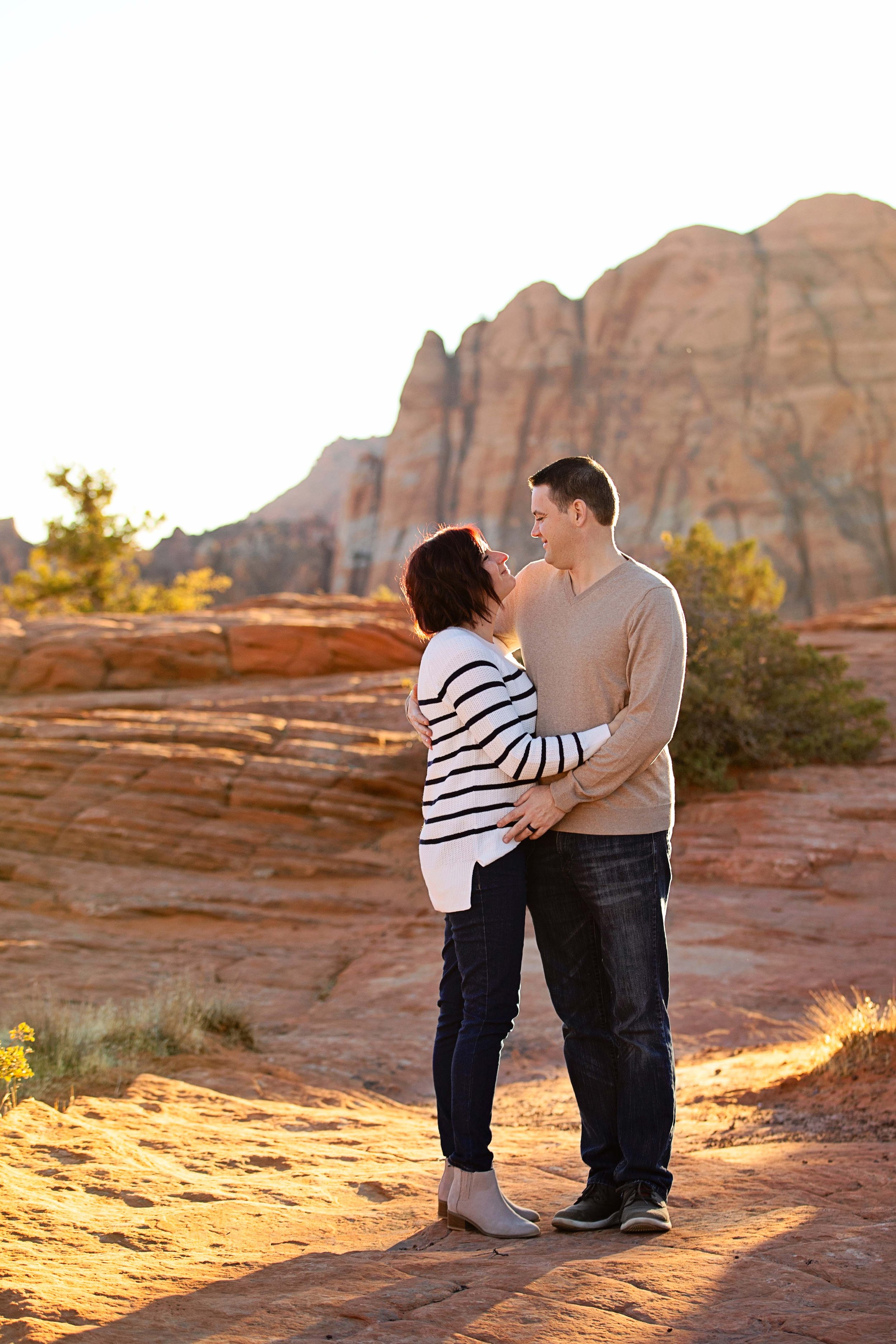 Parents-posing-together-in-the-red-rocks-of-Southern-Utah-family-session