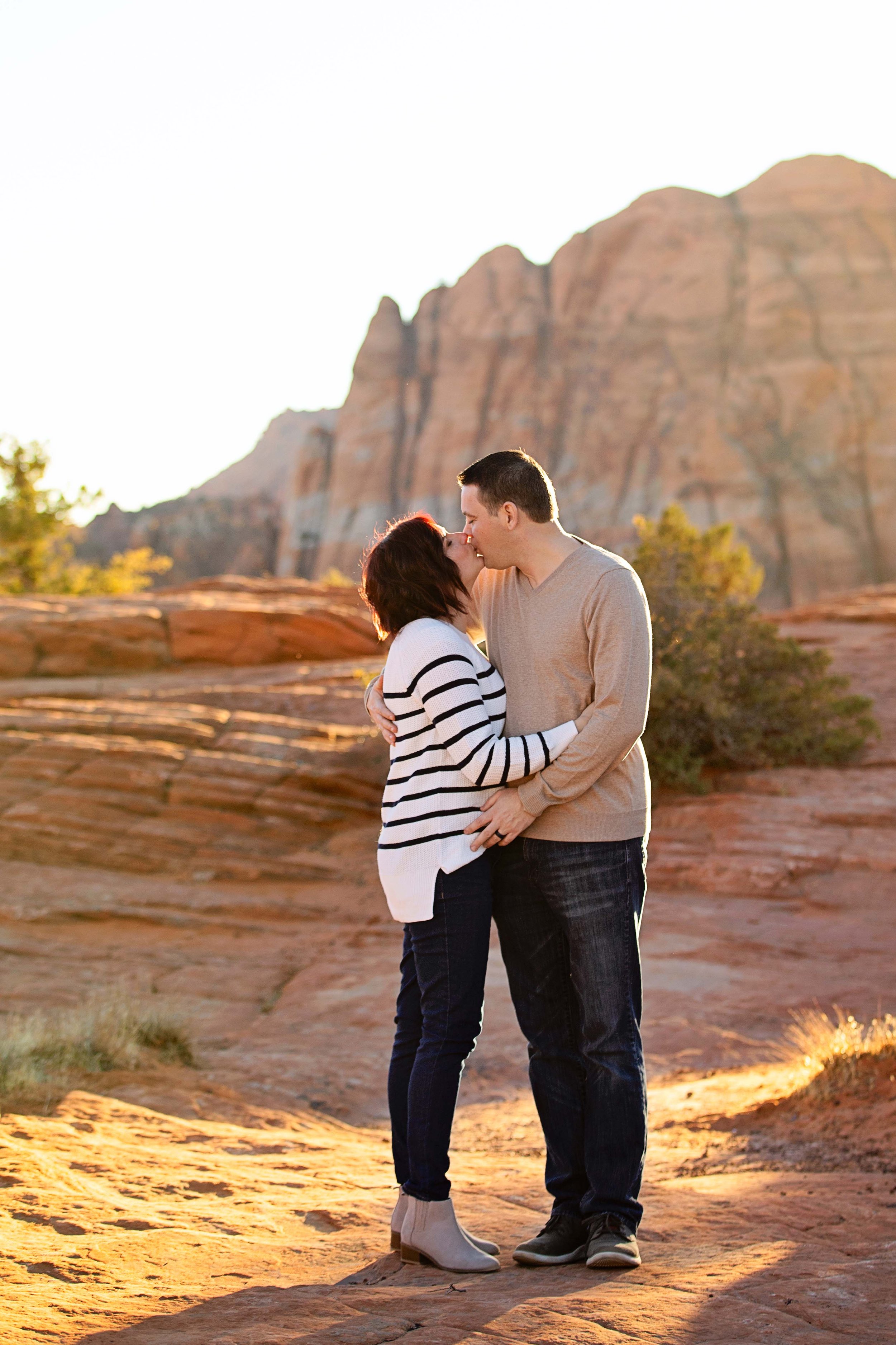 Parents-posing-together-in-the-red-rocks-of-Southern-Utah-family-session