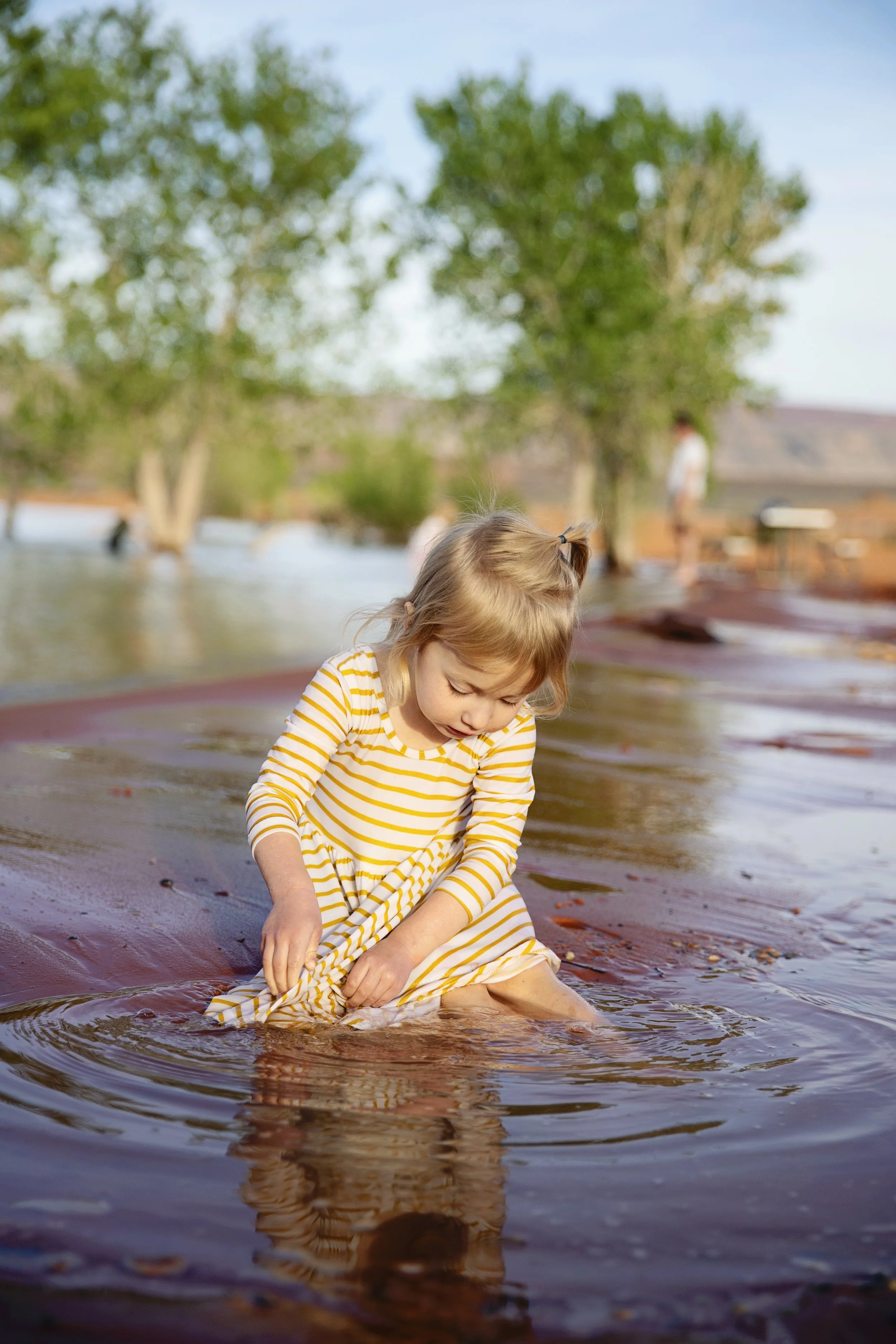 Girl_playing_in_water.jpeg