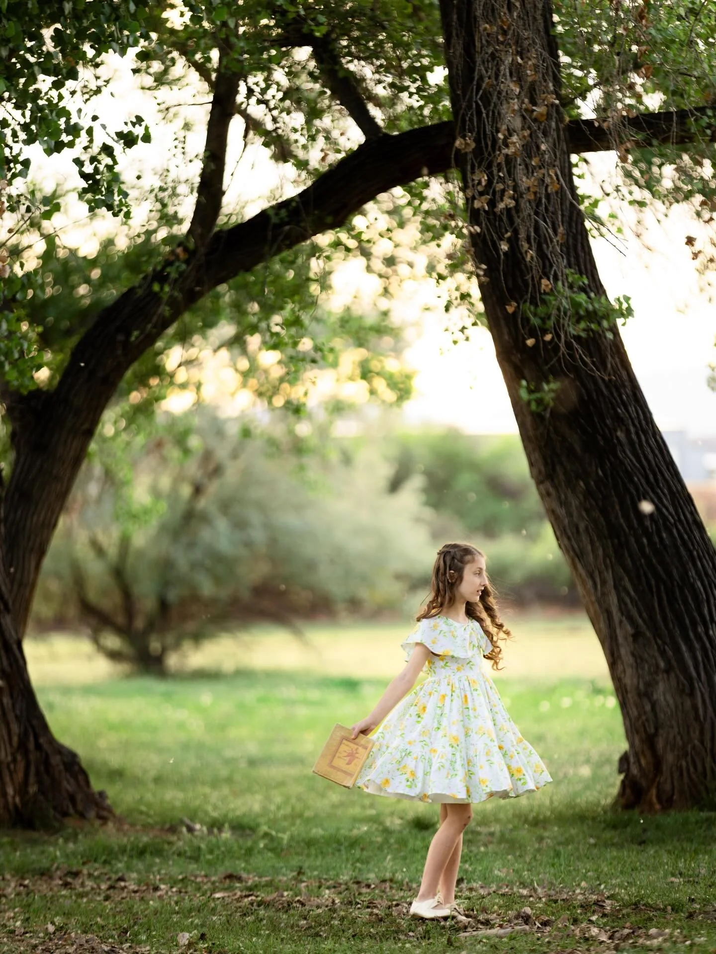 Twirling through her own fairytale. Doesn&rsquo;t this photo look like it&rsquo;s from a scene of a movie!? Such a sweet moment.