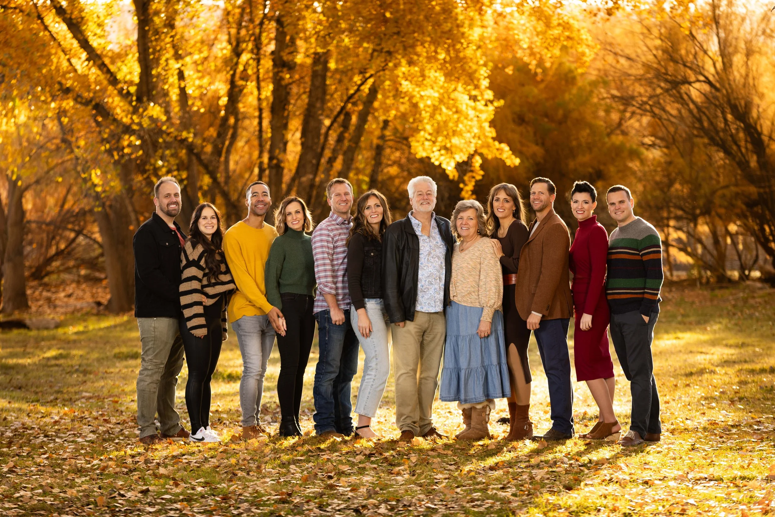 cinematic extended family photo taken in Autumn at the Kirkland Field in Washington Utah.