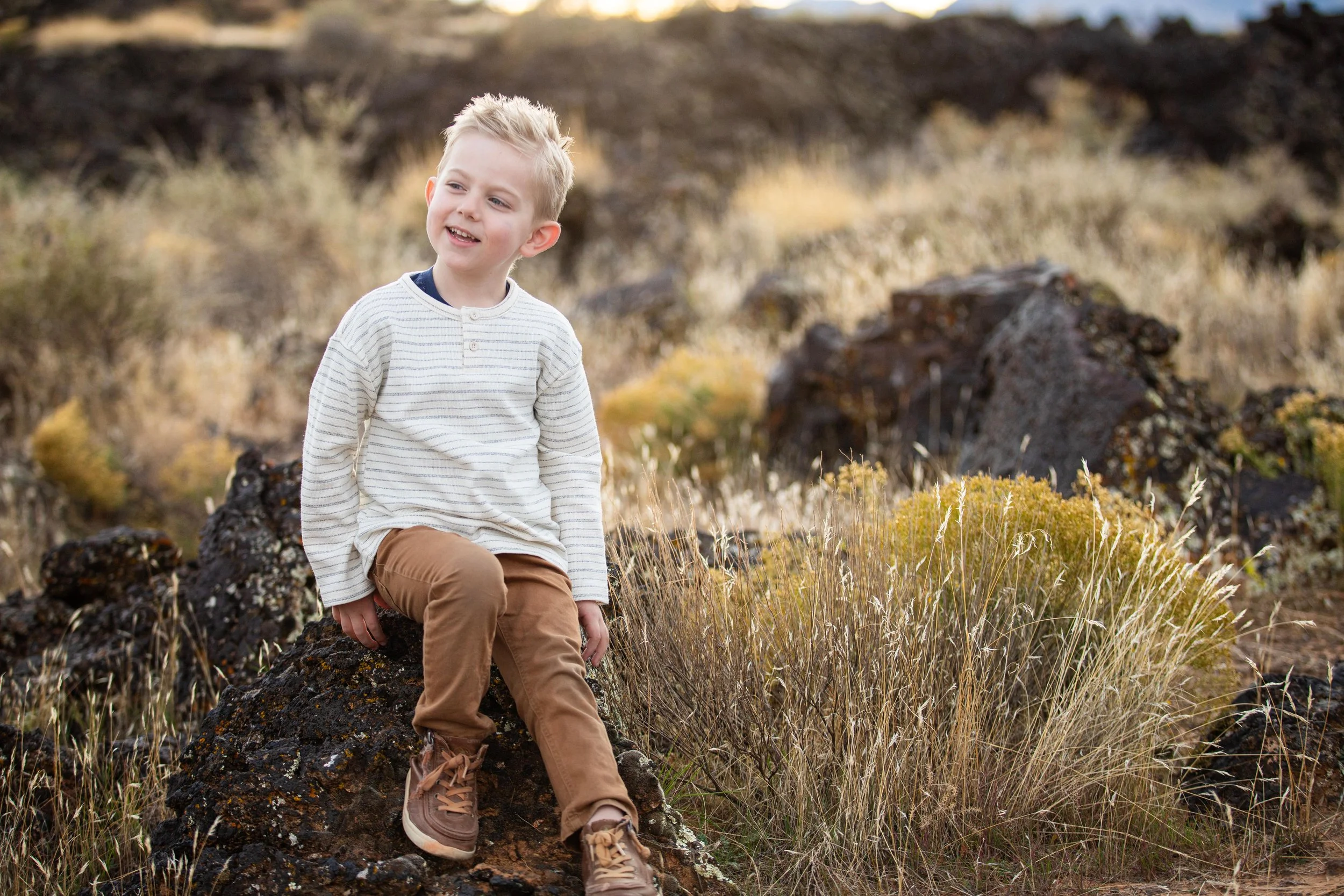 Boy_fall_lava_fields_Santa_clara_utah.jpeg